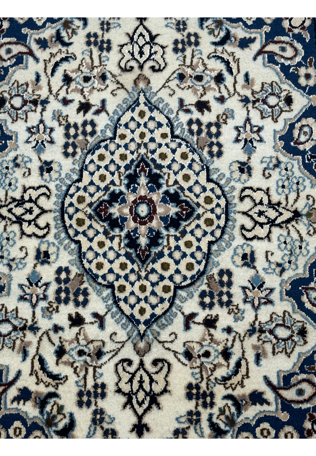 Close-up of medallion design on 3x4'10" Persian Nain Rug
