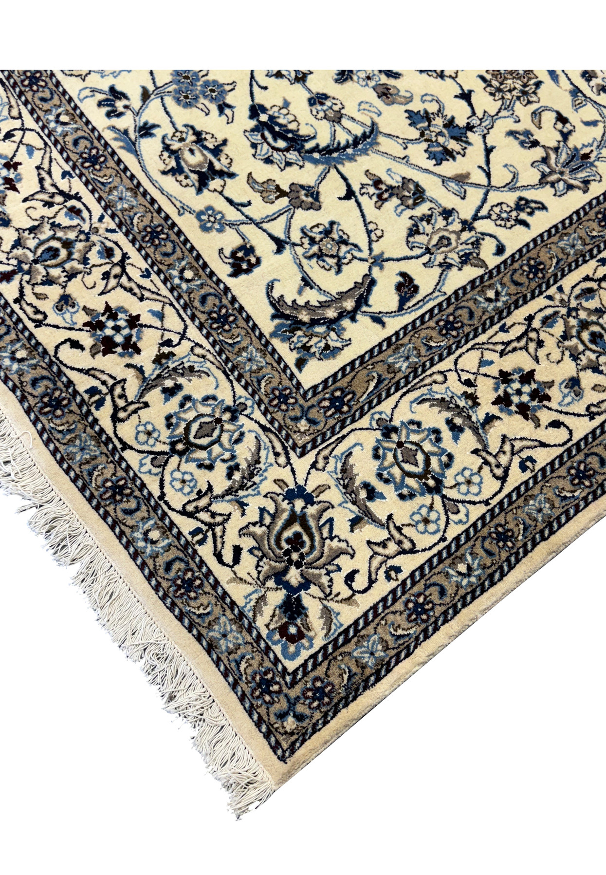Corner view of the 8'2 x 11'6 Persian Nain rug showcasing the fine border work.