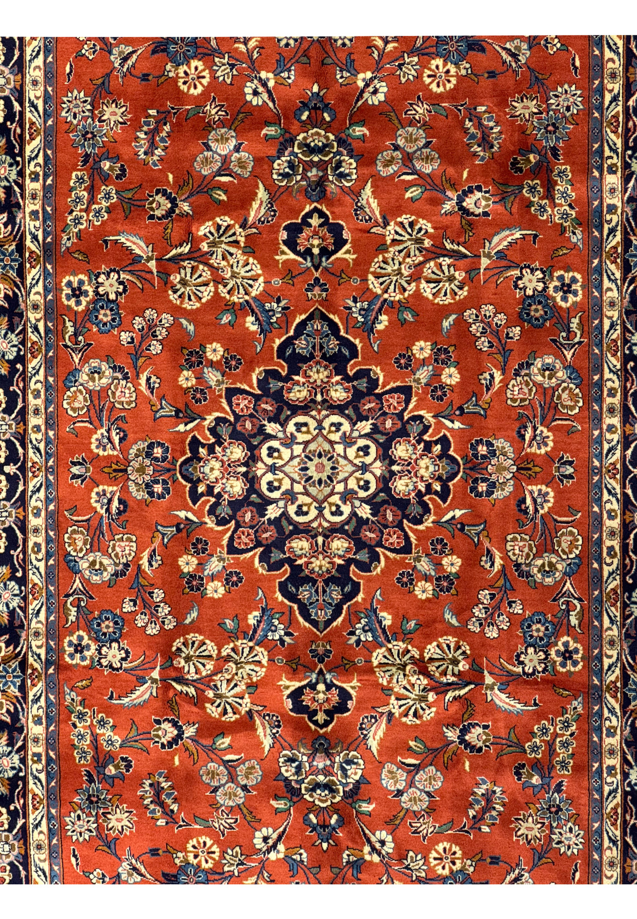 Midfield section of 6'6 x 10'2 Persian Sarough Rug with detailed floral designs and vibrant burnt orange field.