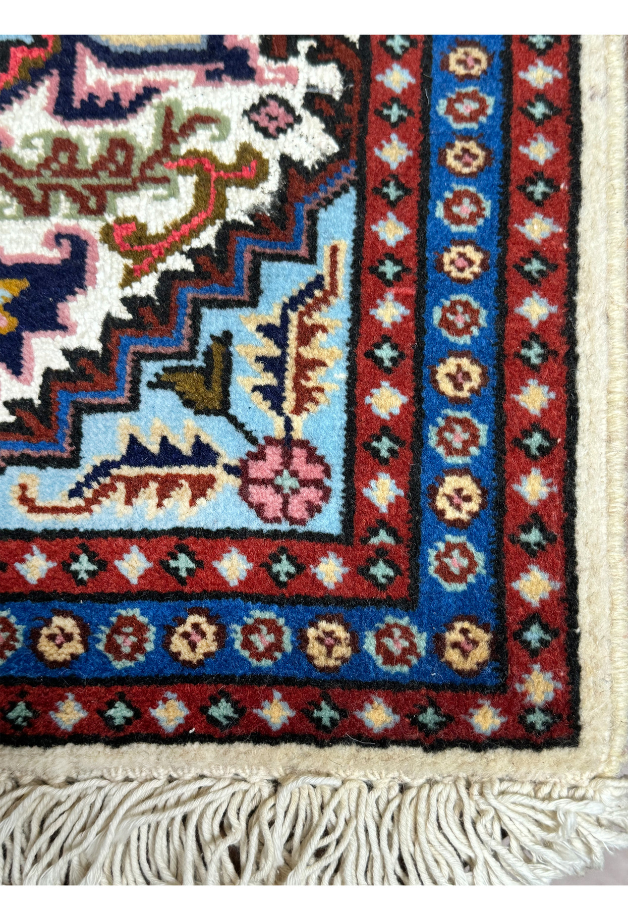 Border detail of 1'3 x 2' Persian Ardebil Wool & Silk Poshti rug with floral and geometric patterns.