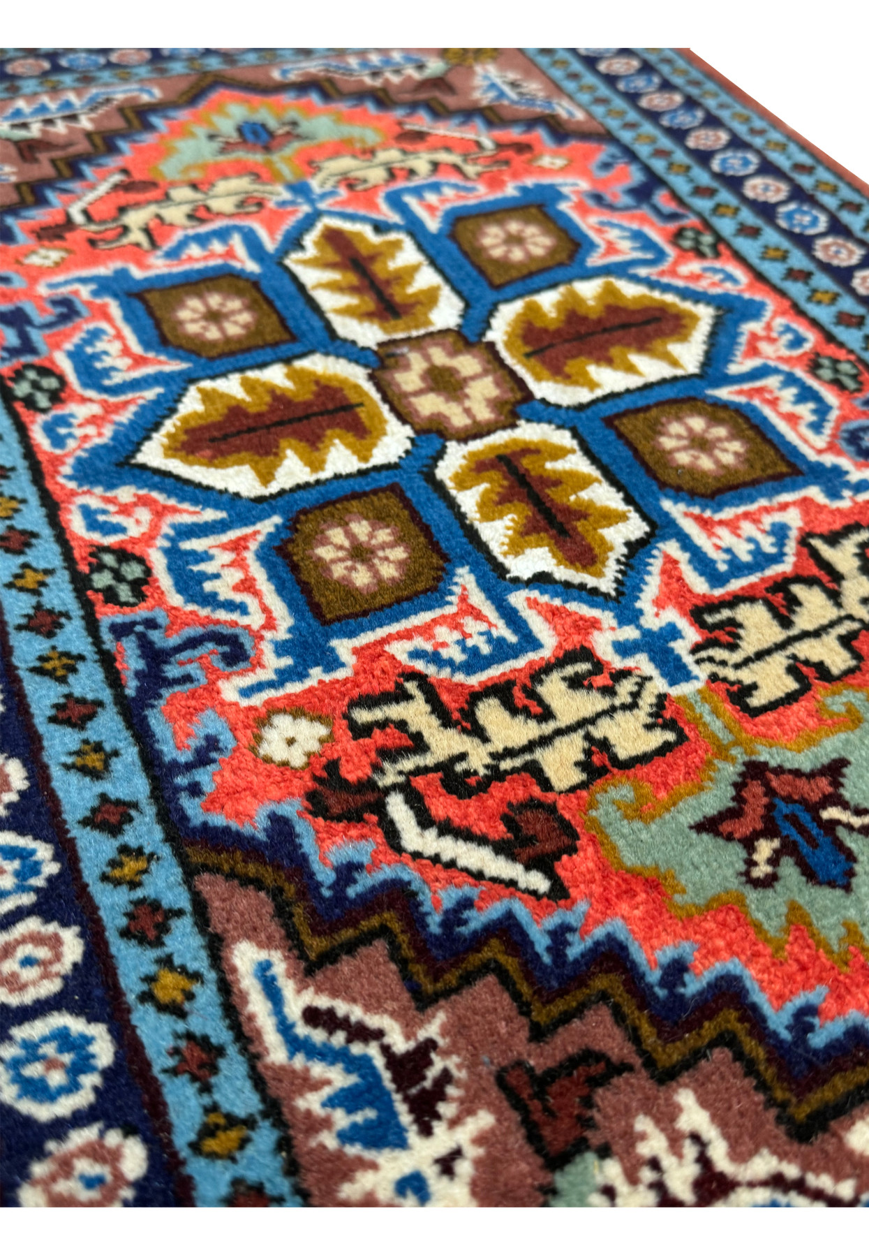 Angled view of the 1'3 x 2 Persian Ardebil Wool & Silk Rug showcasing detailed patterns.
