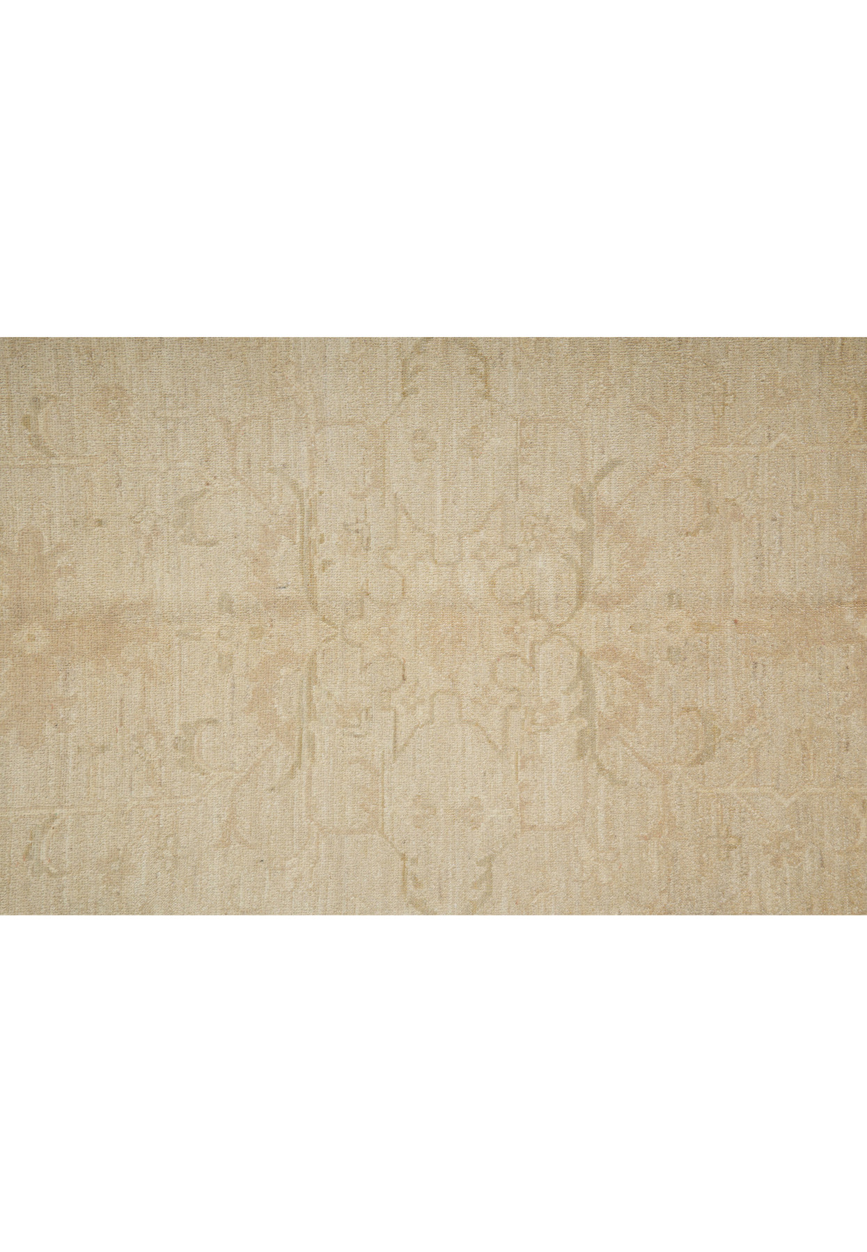 Mid-section of Chobi Ziglar rug highlighting the repeating botanical patterns and subdued vegetable-dyed colors.