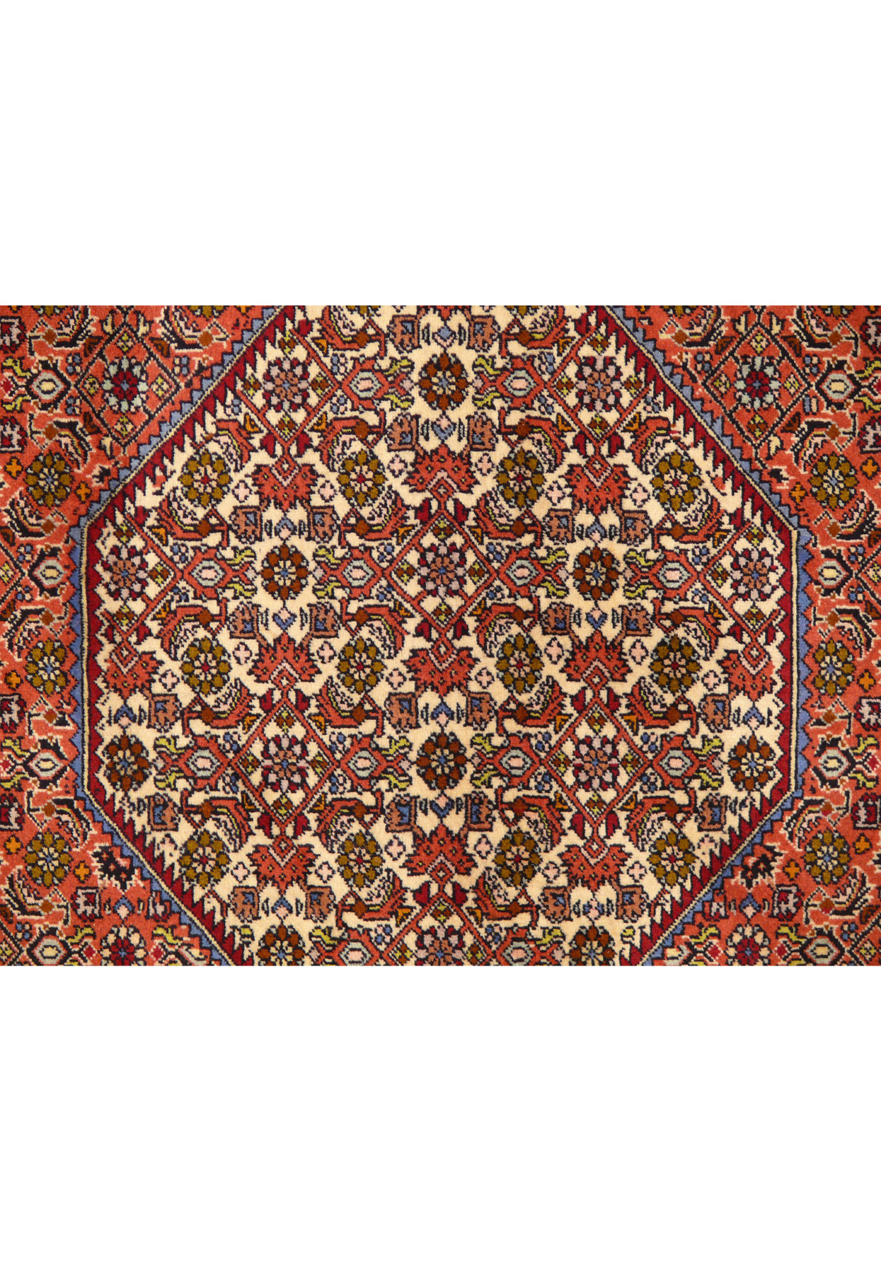 Zoomed view of the medallion area highlighting fine knotwork and contrasting ivory and red colors