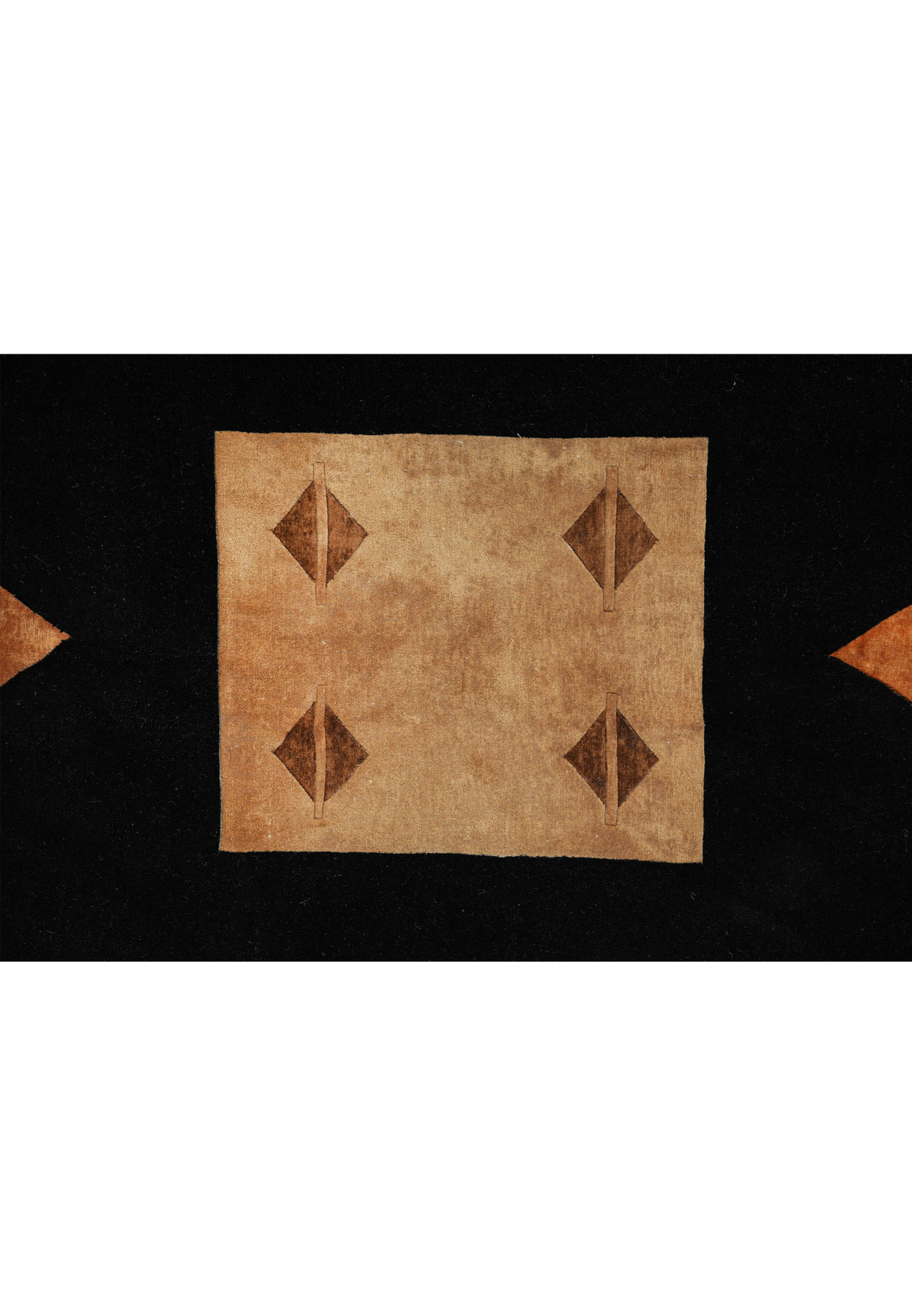 Zoomed-in detail of abstract pattern with soft beige, taupe, and gray tones woven in silk and wool