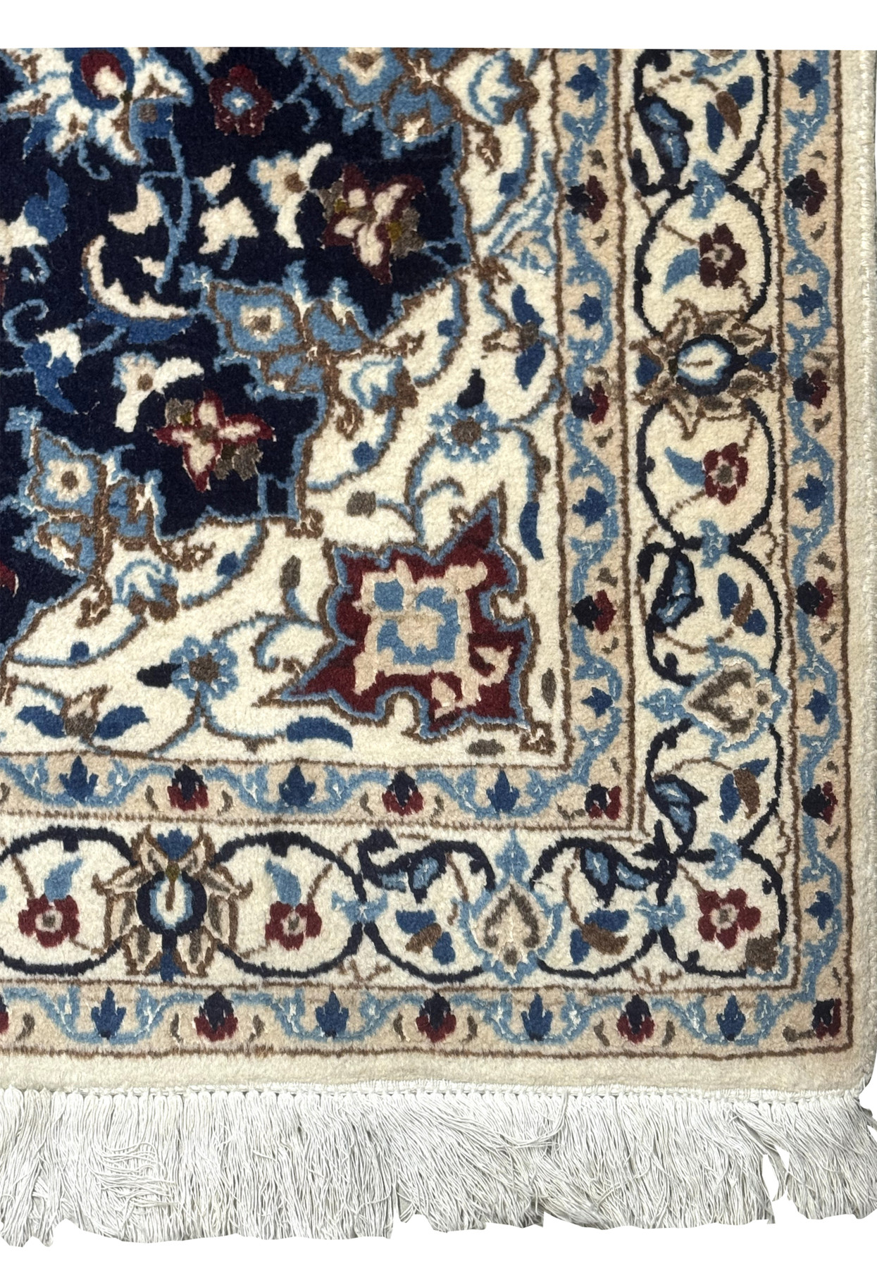 Corner detail showing ivory border and intricate corner spandrel