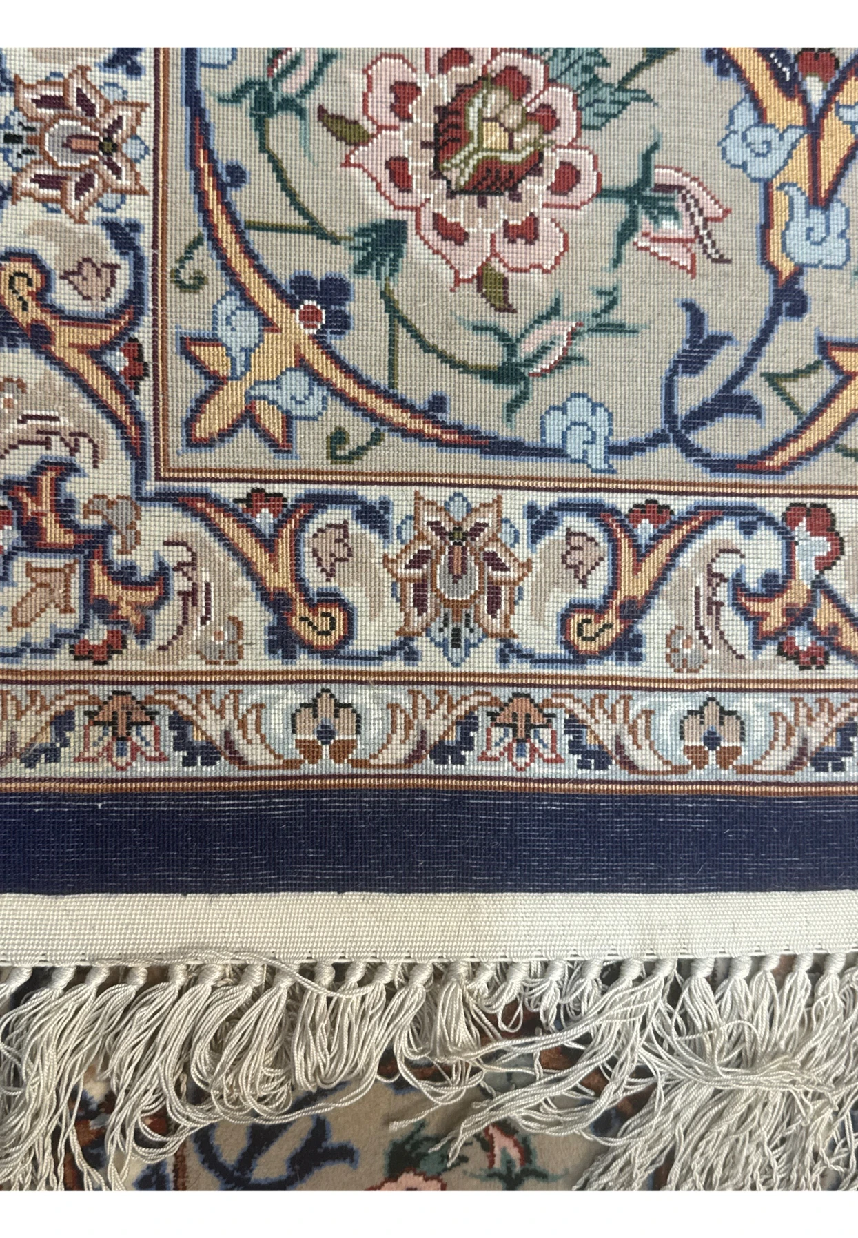 Back view of Persian Isfahan rug showing high knot density and clarity of intricate floral design