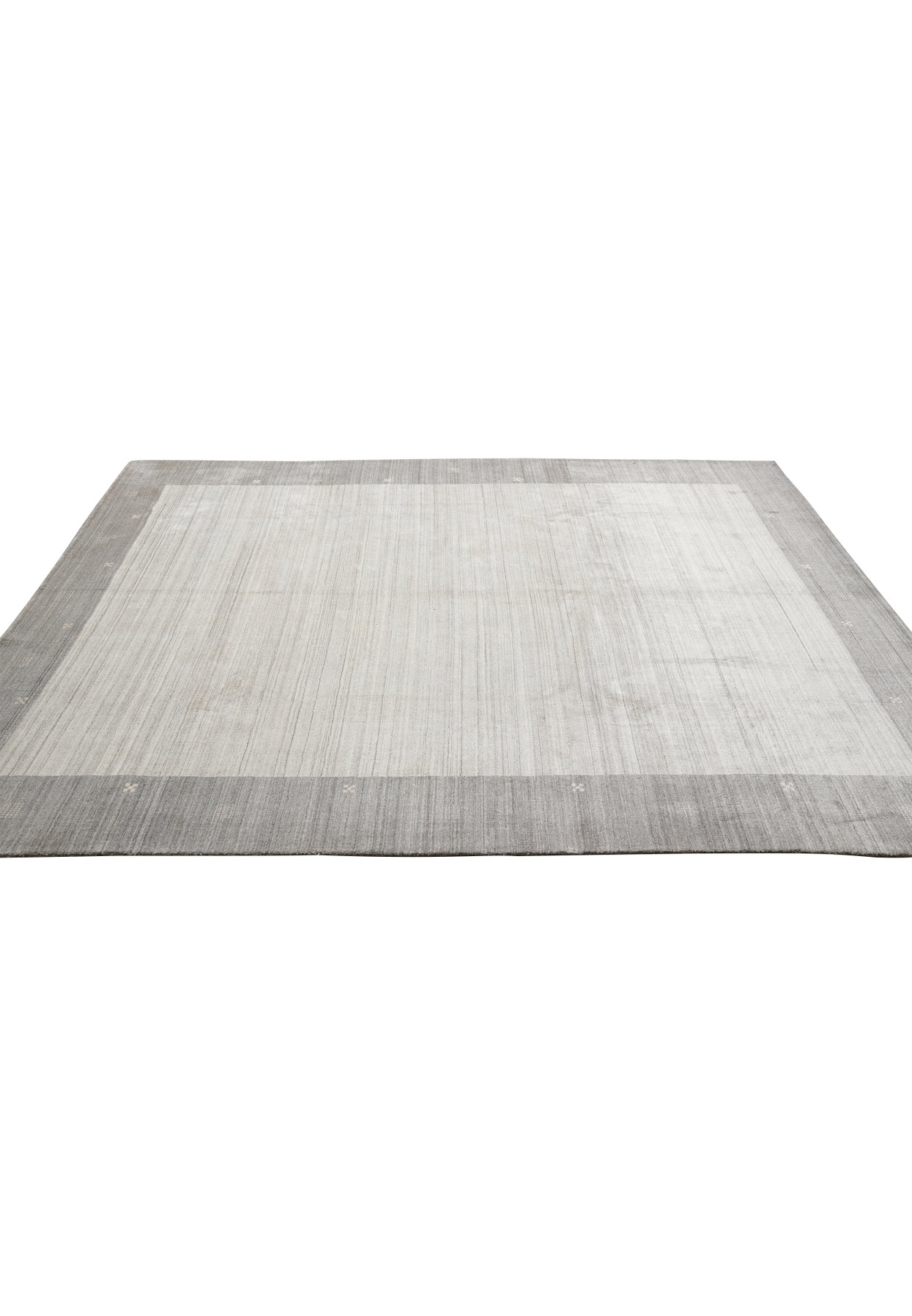 9.2 x 12.1 plain gray handmade wool rug laid flat showing minimalist design