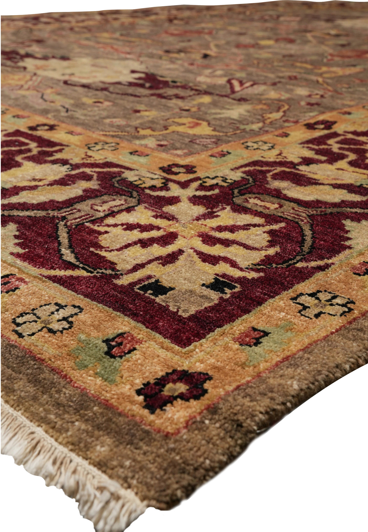 Edge detail of Afghan Chobi Peshawar Rug with golden yellow guard border and burgundy florals