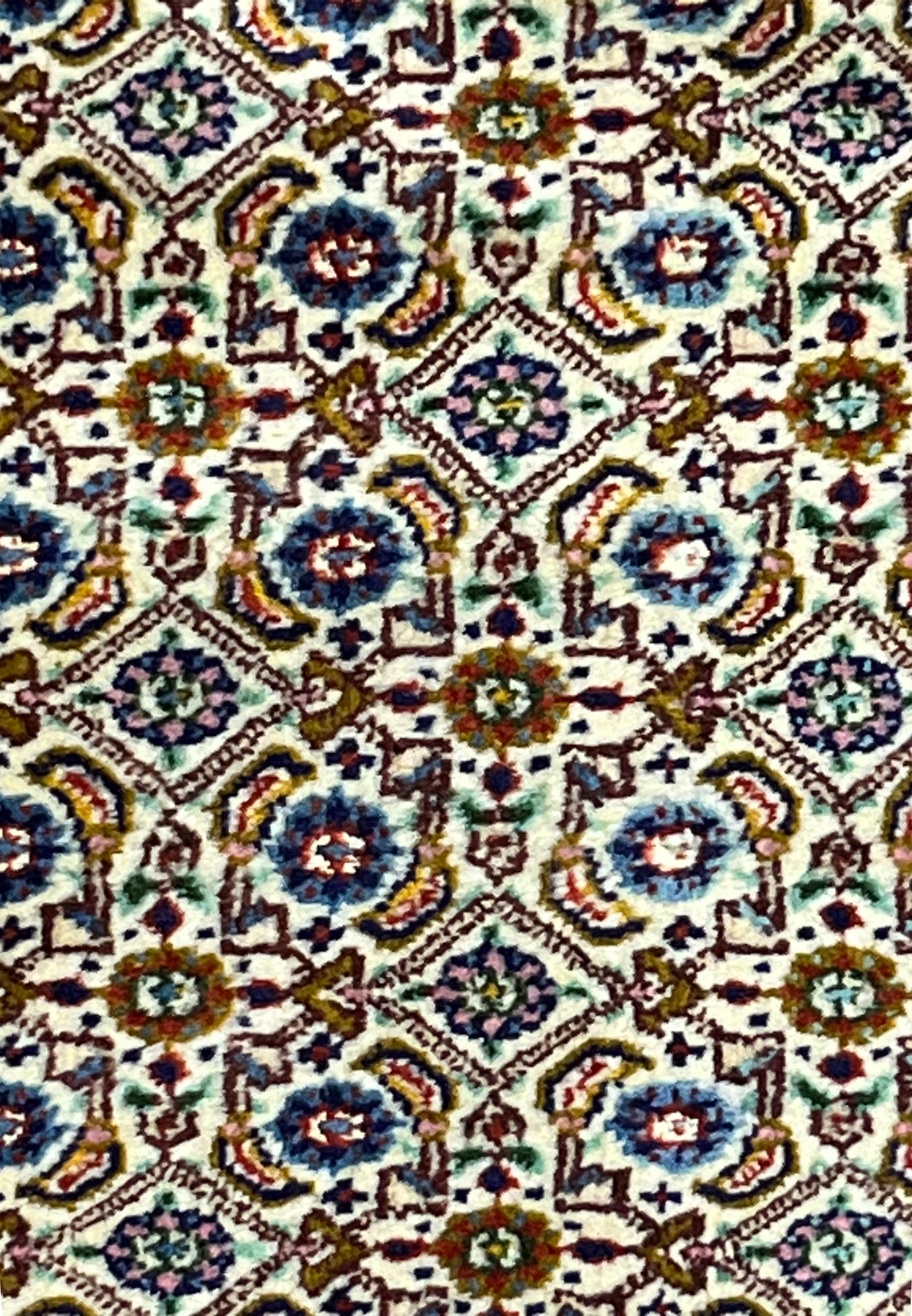 Detailed close-up of Persian Moud rug field pattern with blue and olive accents