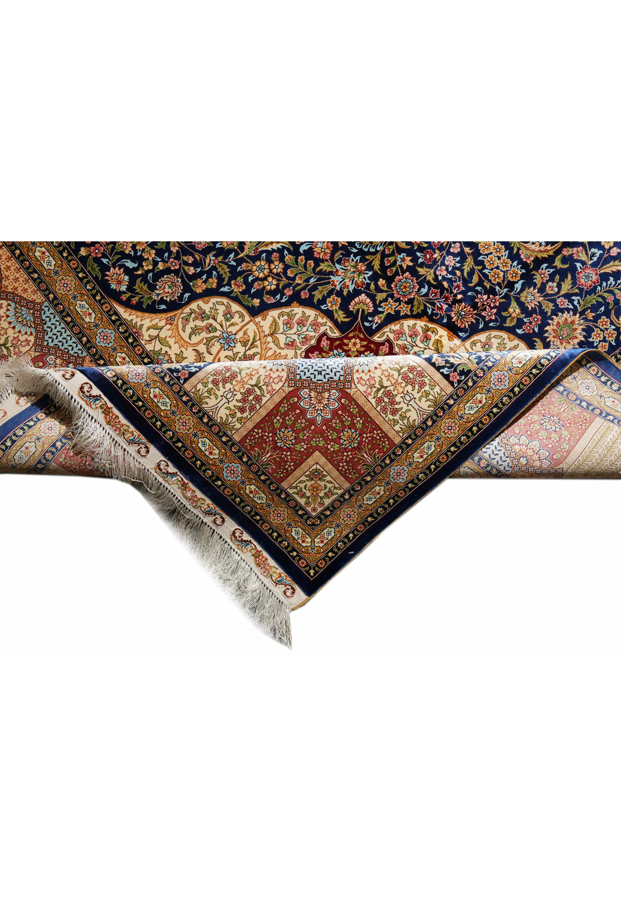 Corner and fringe close-up showing the neat finishing, fine border lines, and silk tassels.