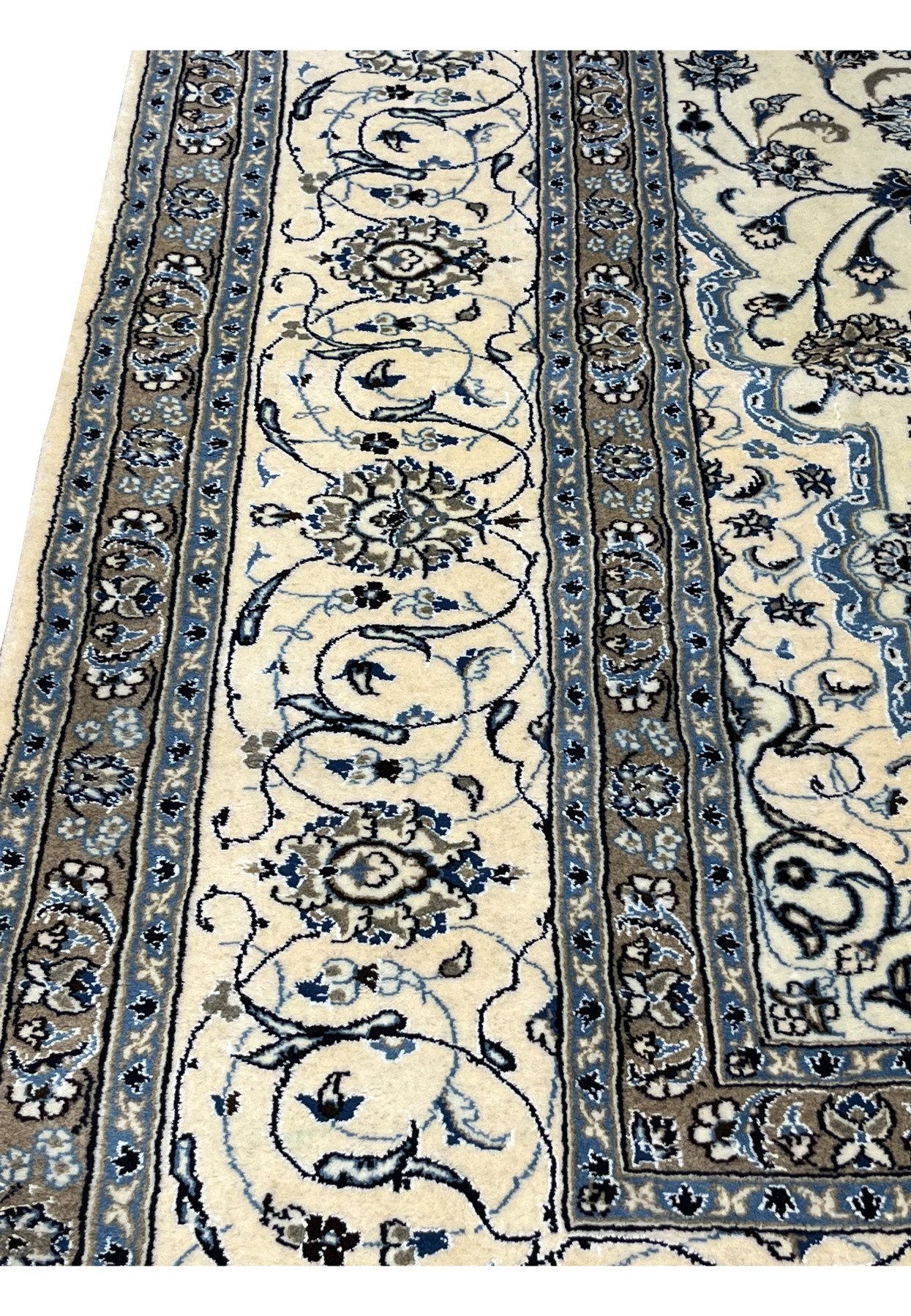 Detailed border section of 10' x 13'2 Persian Nain 9LA Rug featuring delicate floral scrolls and silk accents.