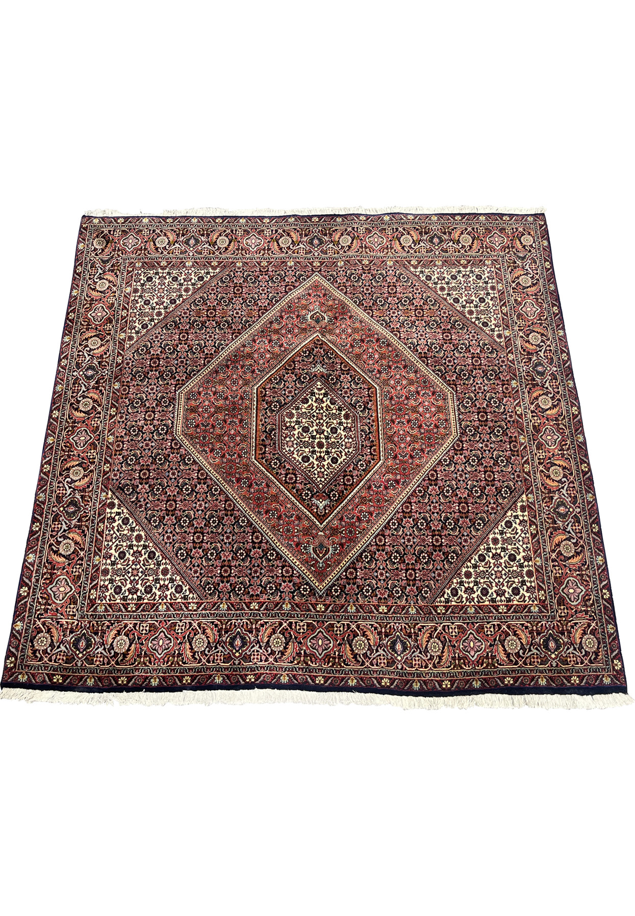 Laid-down perspective of square Bijar Persian rug highlighting its balanced medallion layout, intricate pattern, and deep rust and navy palette.