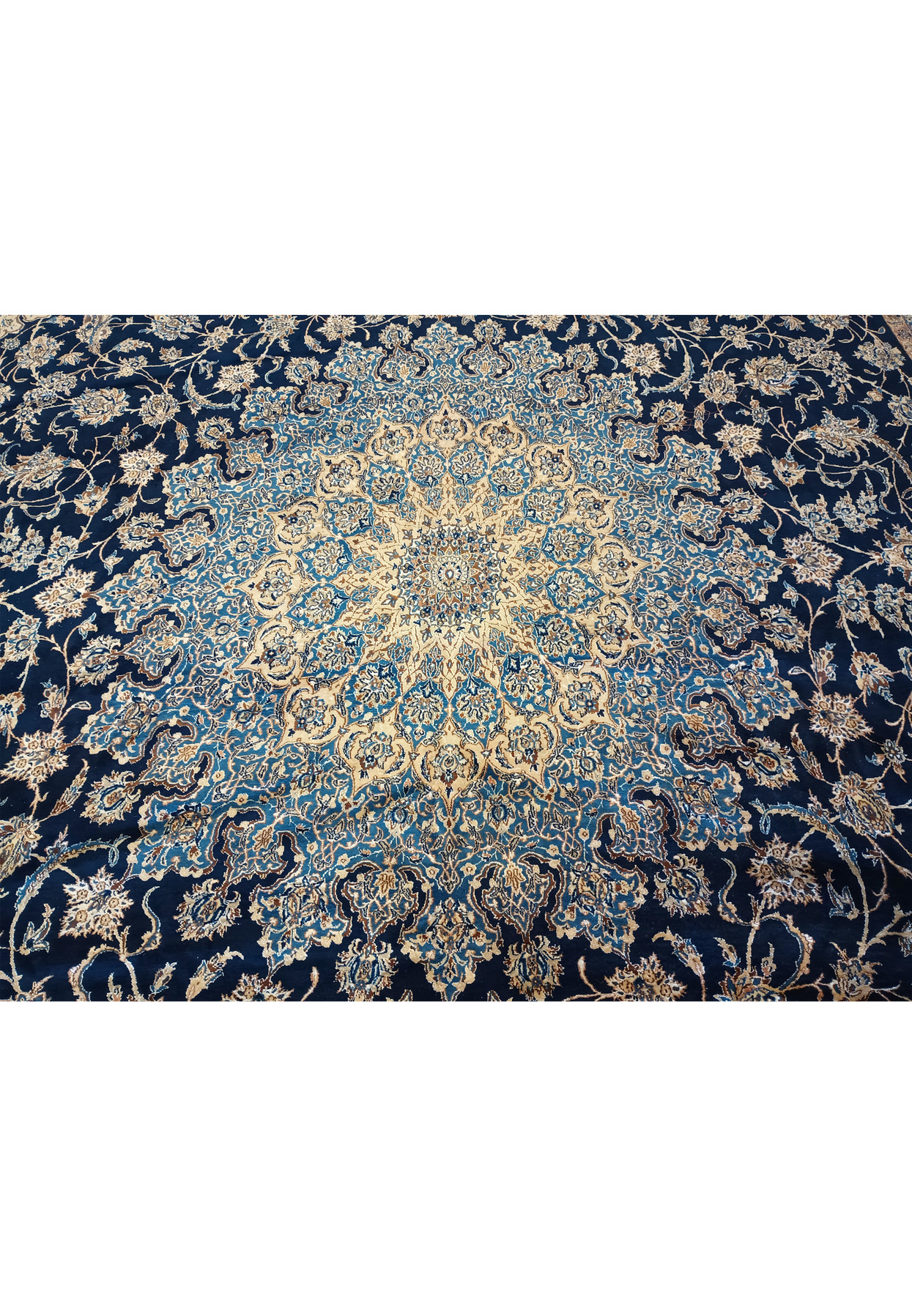 Close-up of 14x25'6 Nain 9 LA Persian rug medallion with silk highlights and intricate pattern.