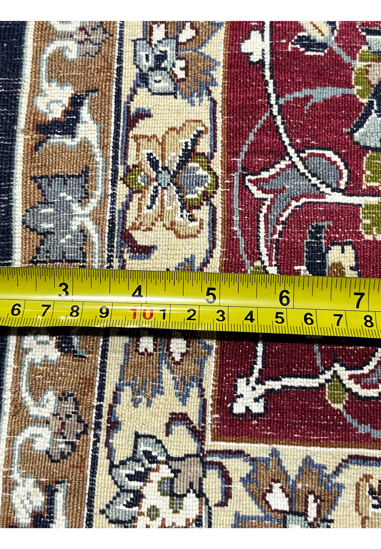 Backside close-up showing knot density, crisp pattern definition, and craftsmanship quality of the 7x11 Persian Isfahan rug.