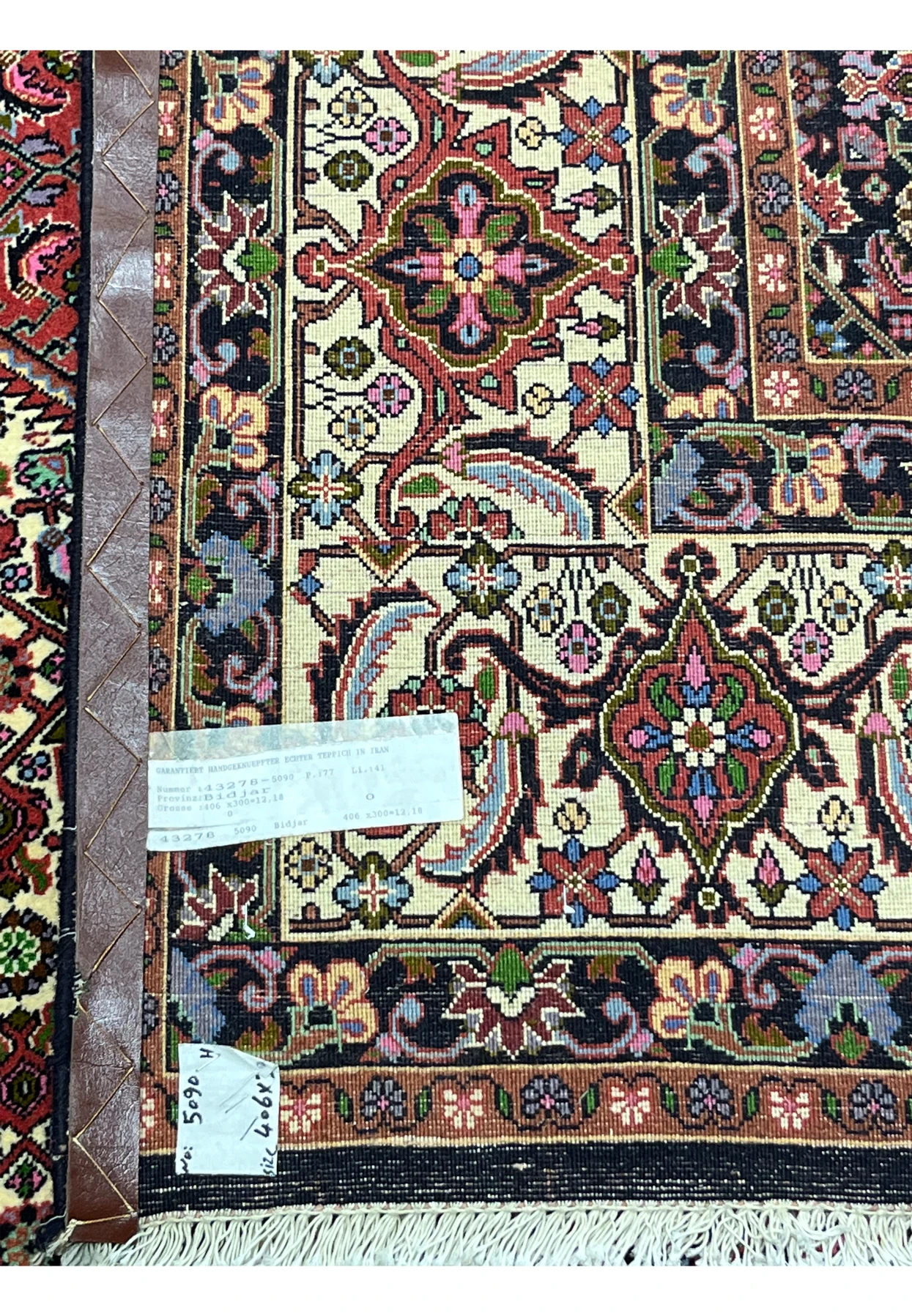 Full back view of rare size Persian Bijar iron rug displaying uniform knot structure and heavy handwoven foundation