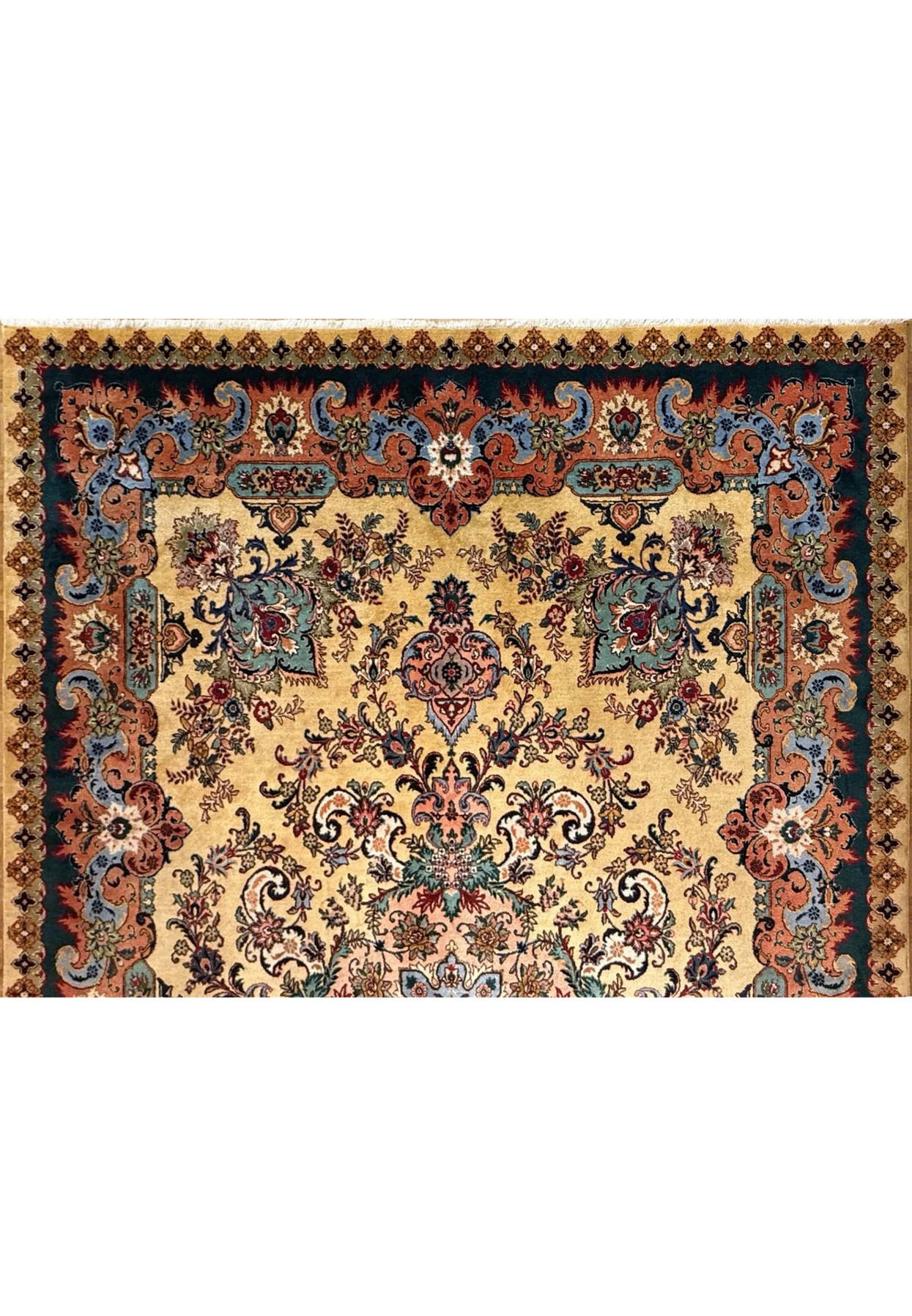Upper section of Persian Tabriz rug showing floral cartouches in coral, teal and slate blue tones