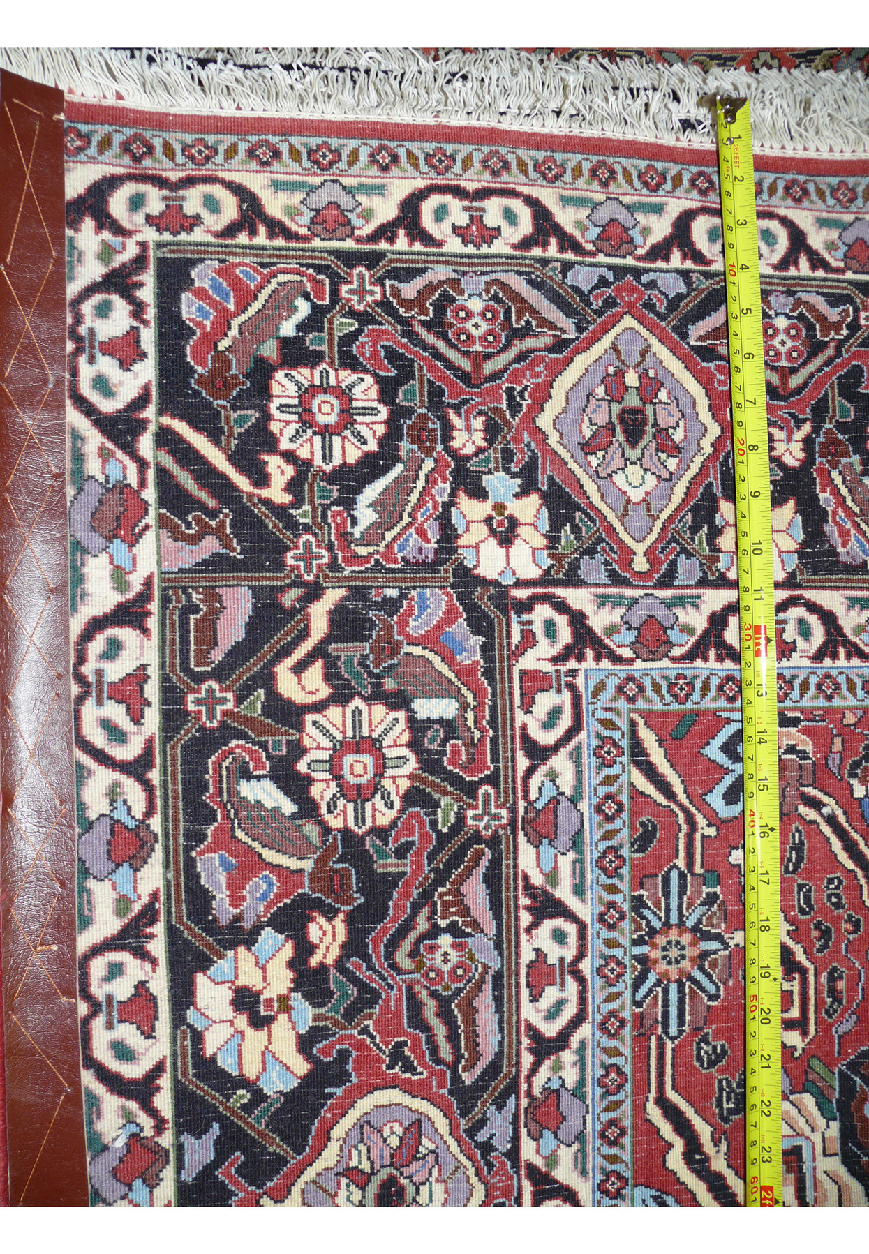 Backside of dense Bijar iron rug highlighting heavy wool pile, tight knot structure, and strong cotton foundation