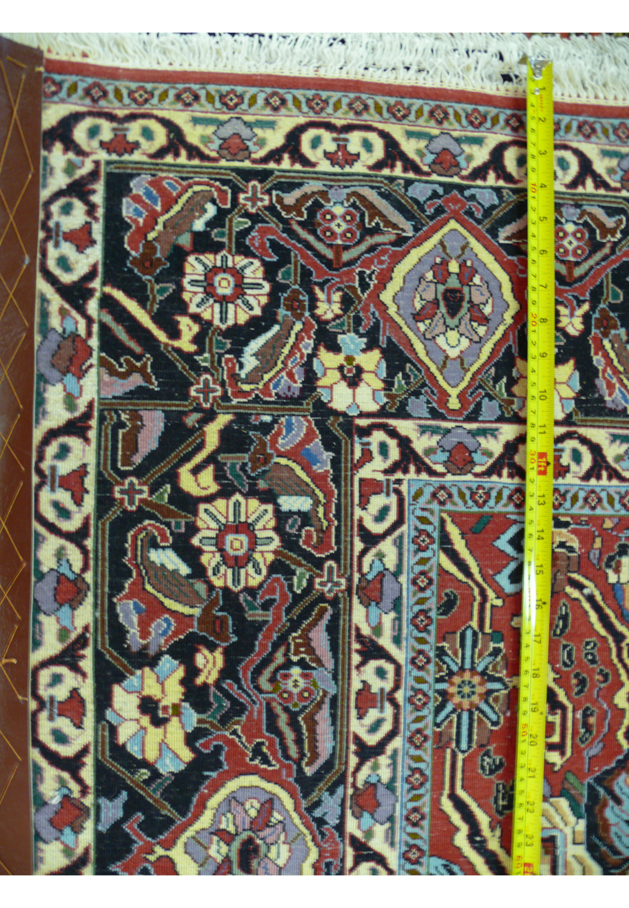 Back view of hand knotted Bijar iron rug showing tight dense wool structure and firm cotton foundation