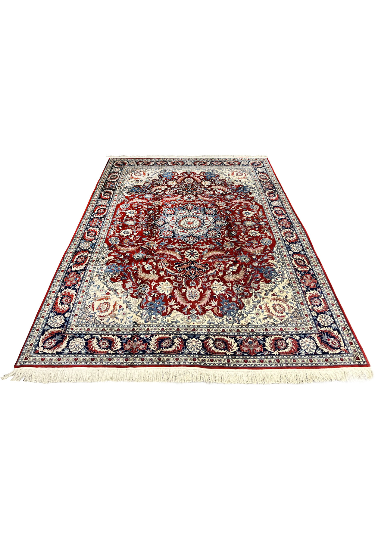 Laid down 8'5 x 11'8 floral Persian Isfahan rug with deep red field, intricate ivory floral vines, and classic navy border
