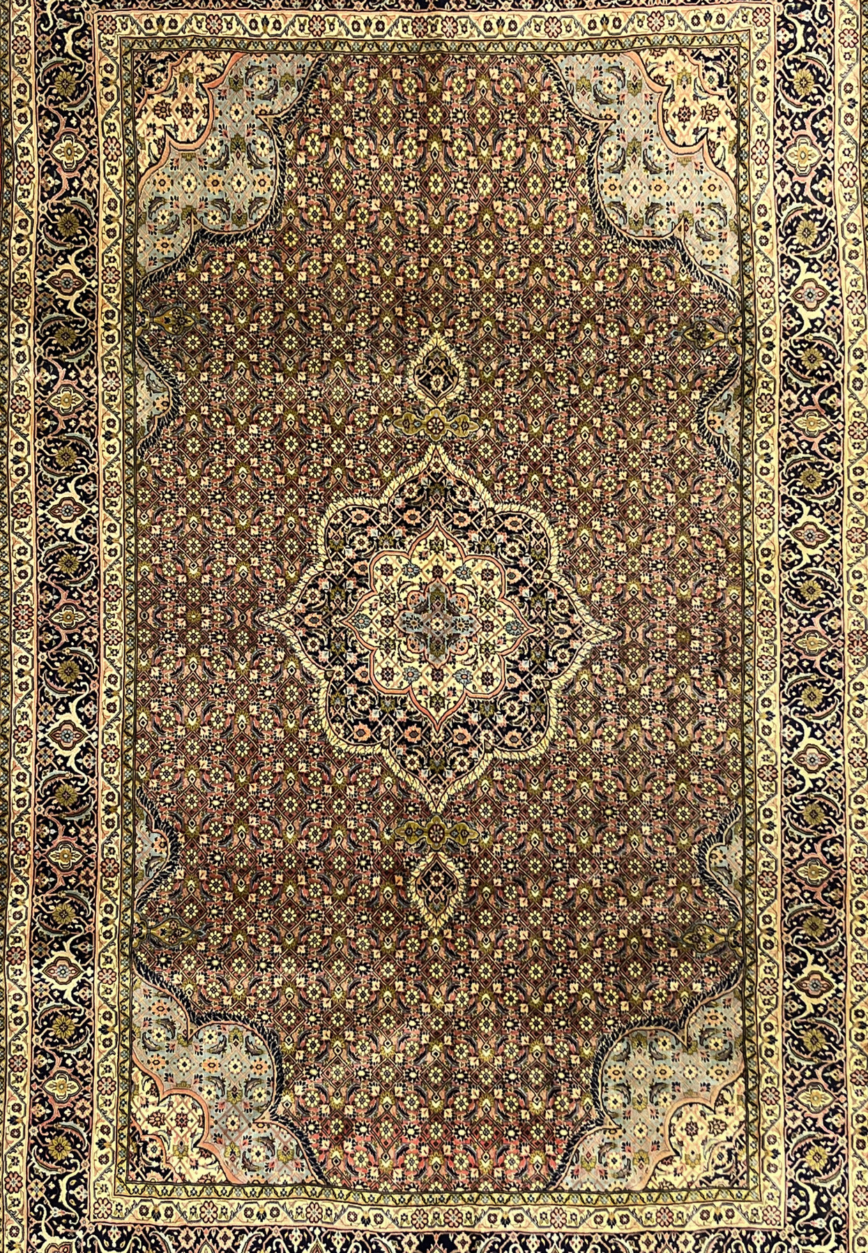 Midfield detail of Persian Bijar rug highlighting compact floral lattice and dense knotting.