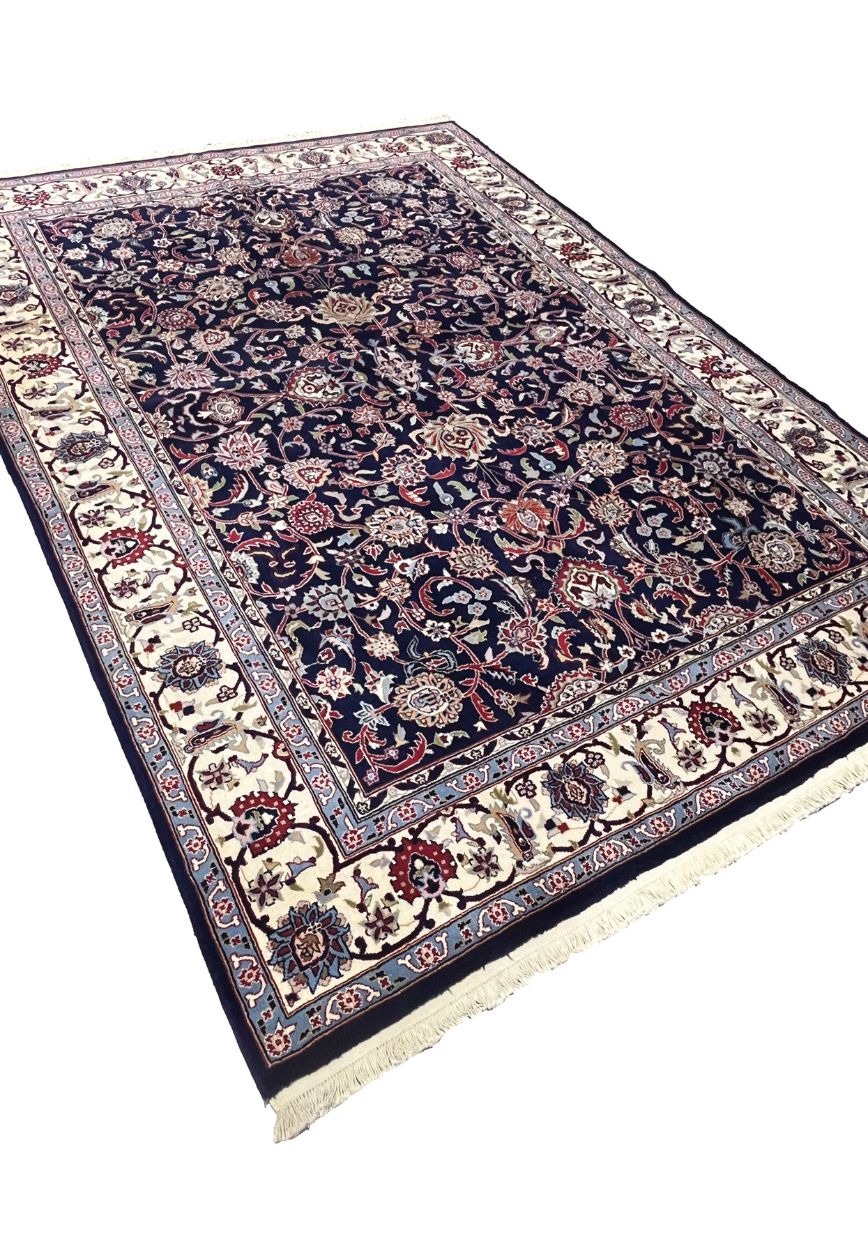 Angled view of Persian Sarough kork rug revealing pile texture and depth of navy blue field