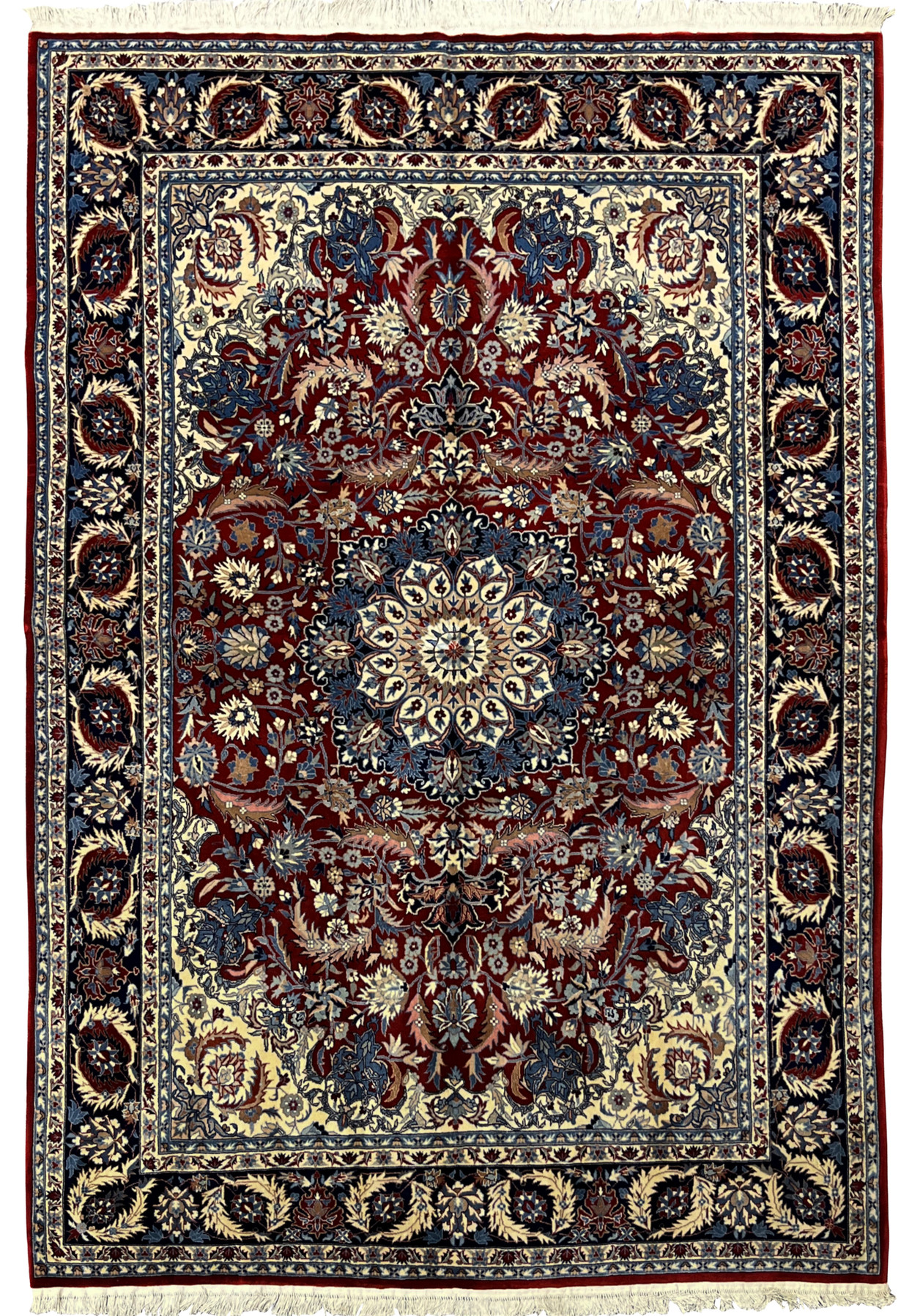Full view of 5'6 x 8 Persian Tabriz rug with burgundy field, ivory spandrels, navy border, and large floral medallion