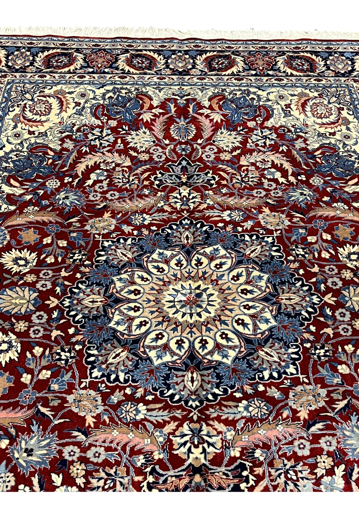 Foundation detail of 5'6 x 8 Persian Tabriz rug showing dense hand-knotted wool structure and fine knot alignment