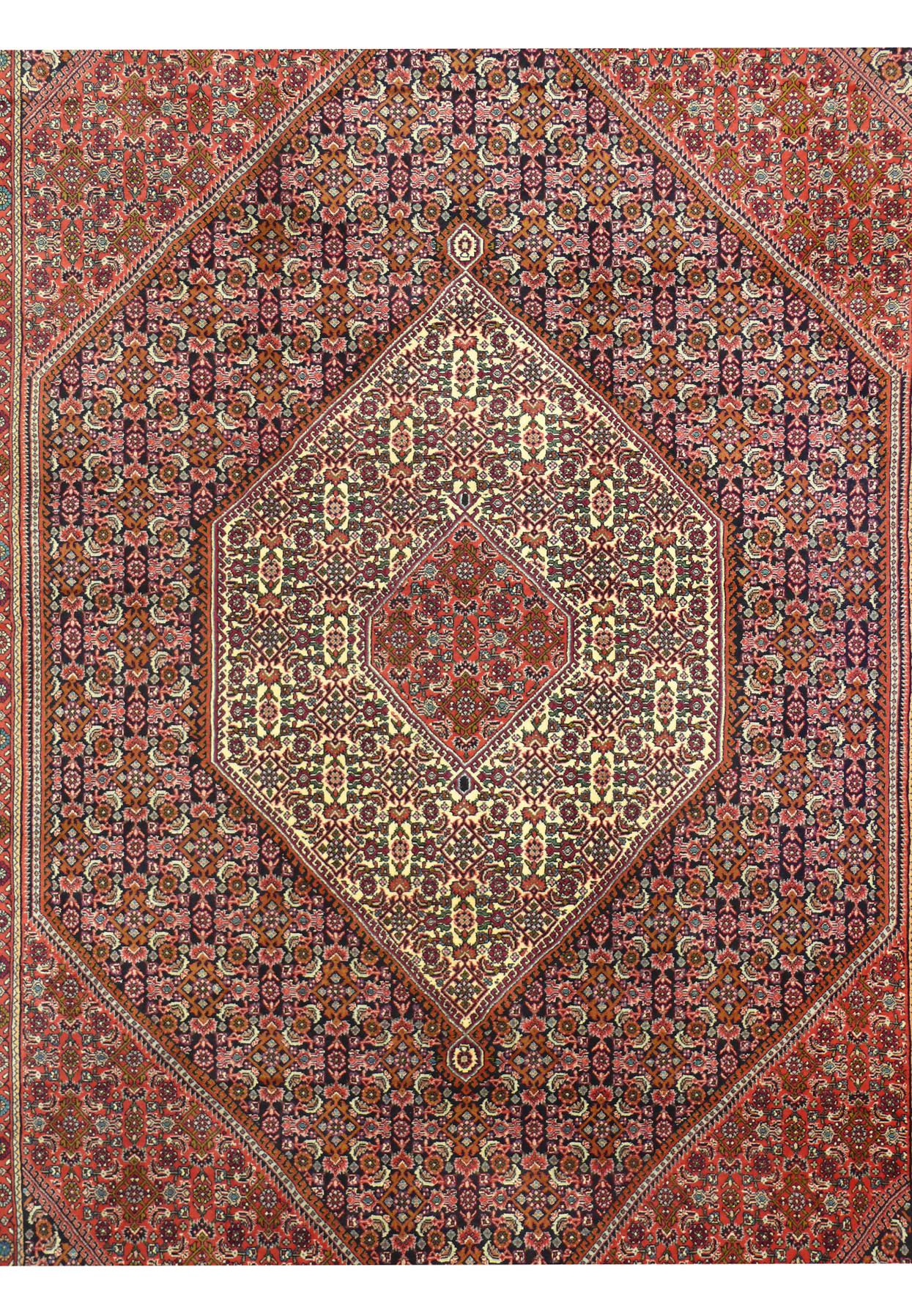 Geometric medallion detail of Persian Bijar rug with deep red and ivory color contrast