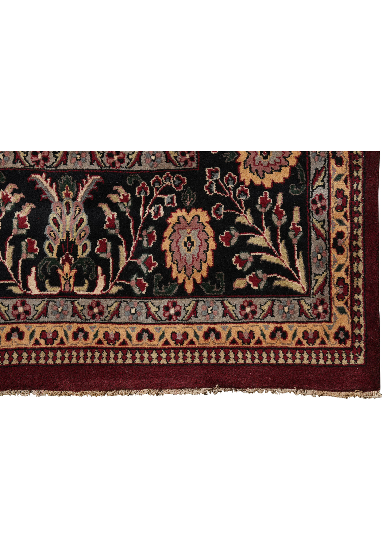 Dark floral border detail of traditional Sarough rug