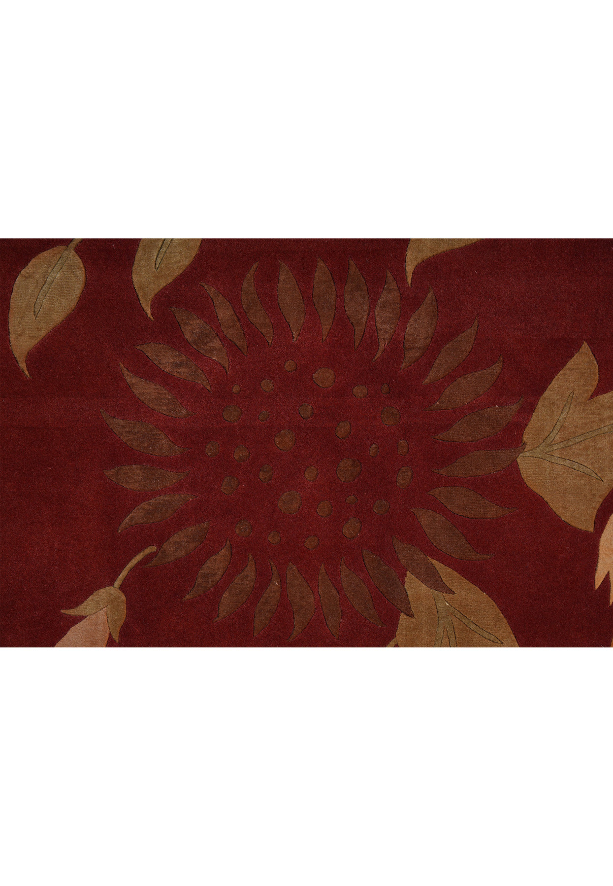 Detailed floral motif close-up on a modern wool and silk Tibetan rug, showing crisp botanical forms and elegant color contrast on a red field