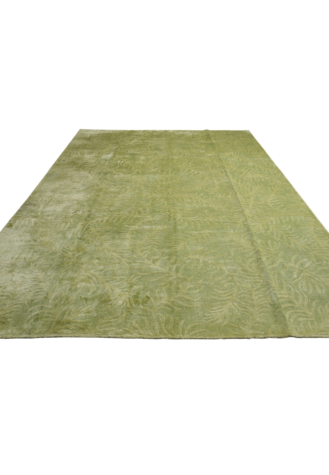 Laid-down view illustrating the full scale, soft color variation, and organic movement of this olive sage green area rug.
