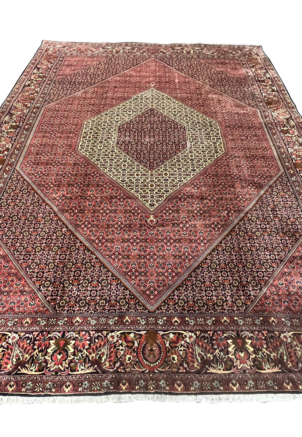 Top angle view highlighting the structure and symmetry of a large Persian Bijar iron rug