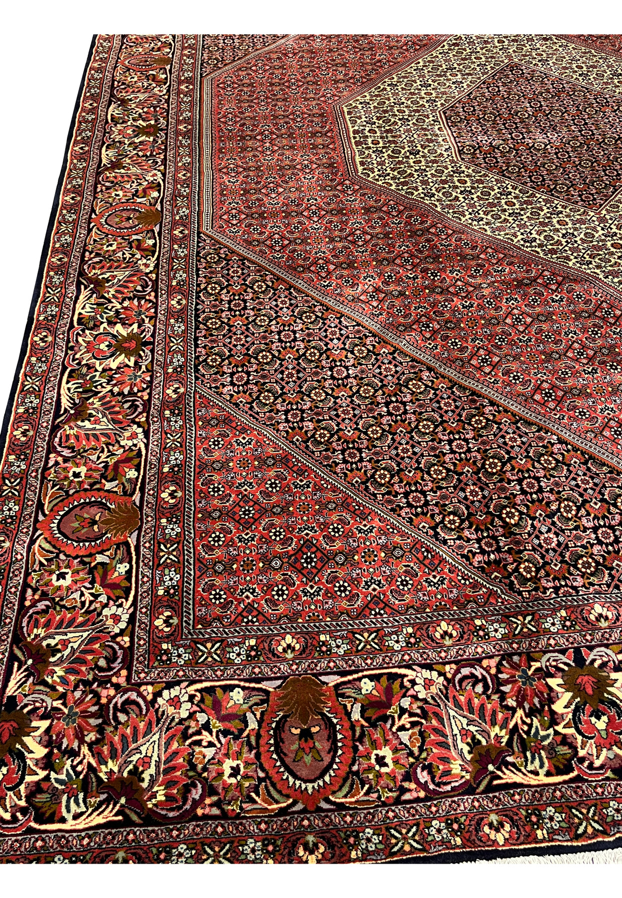 Inner border detail framing the diamond medallion in a hand knotted Persian Bijar iron rug