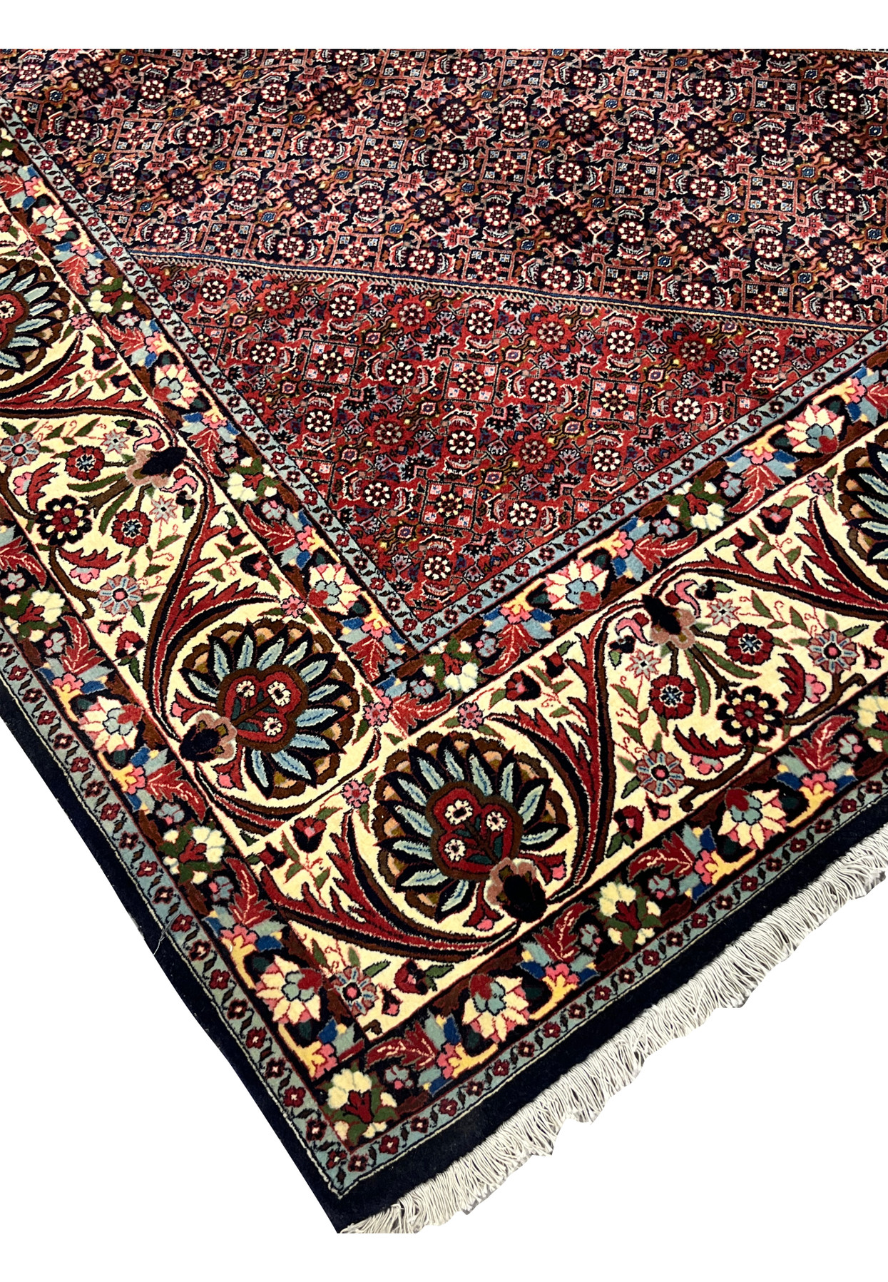 Edge detail showing the firm construction and tightly packed wool pile of a Persian Bijar iron rug
