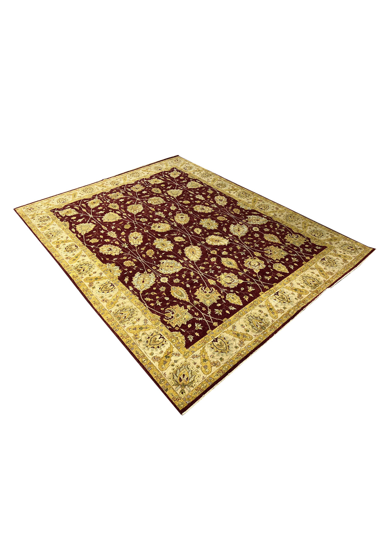Angled view highlighting the depth and scale of a burgundy and gold Zigler Chobi rug