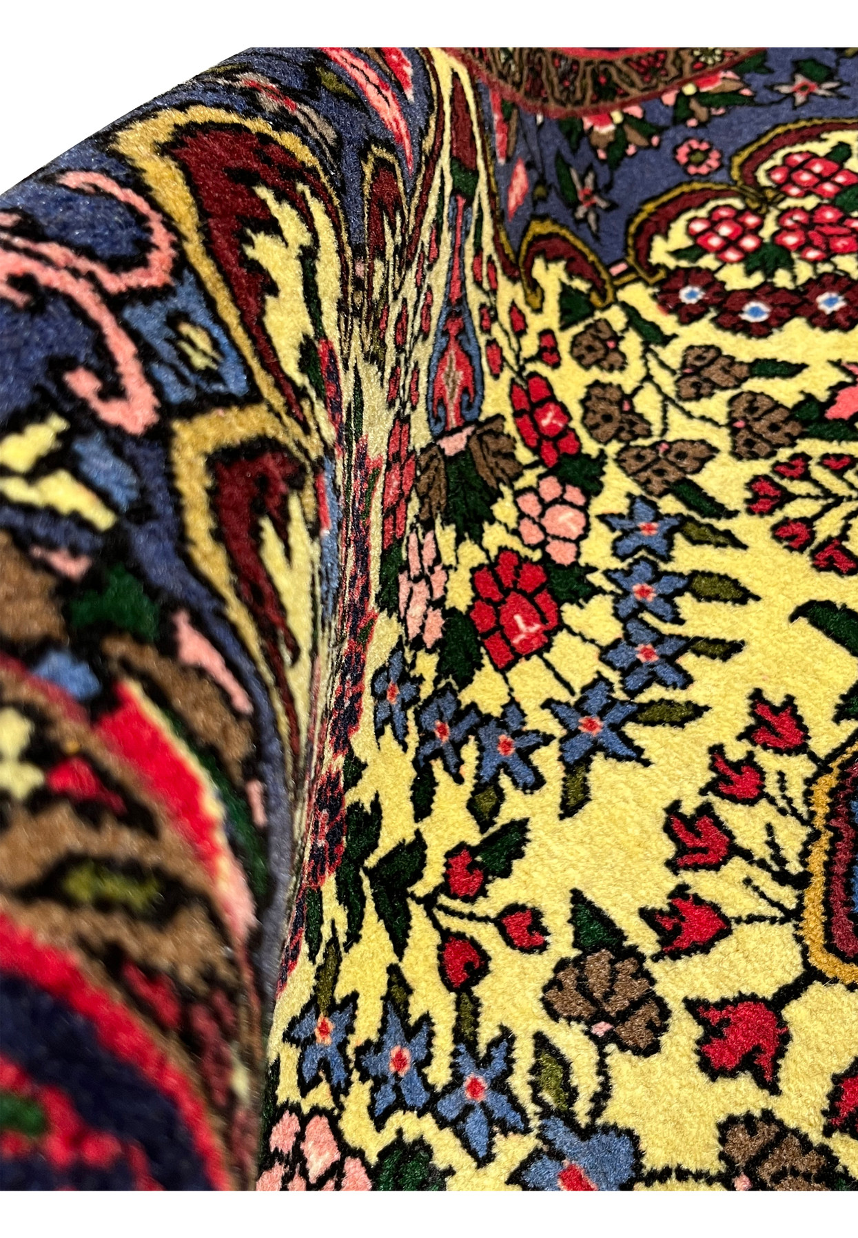 Backside view of Persian Bijar rug revealing dense knotting, cotton foundation, and tight weave that gives Bijar rugs their strength