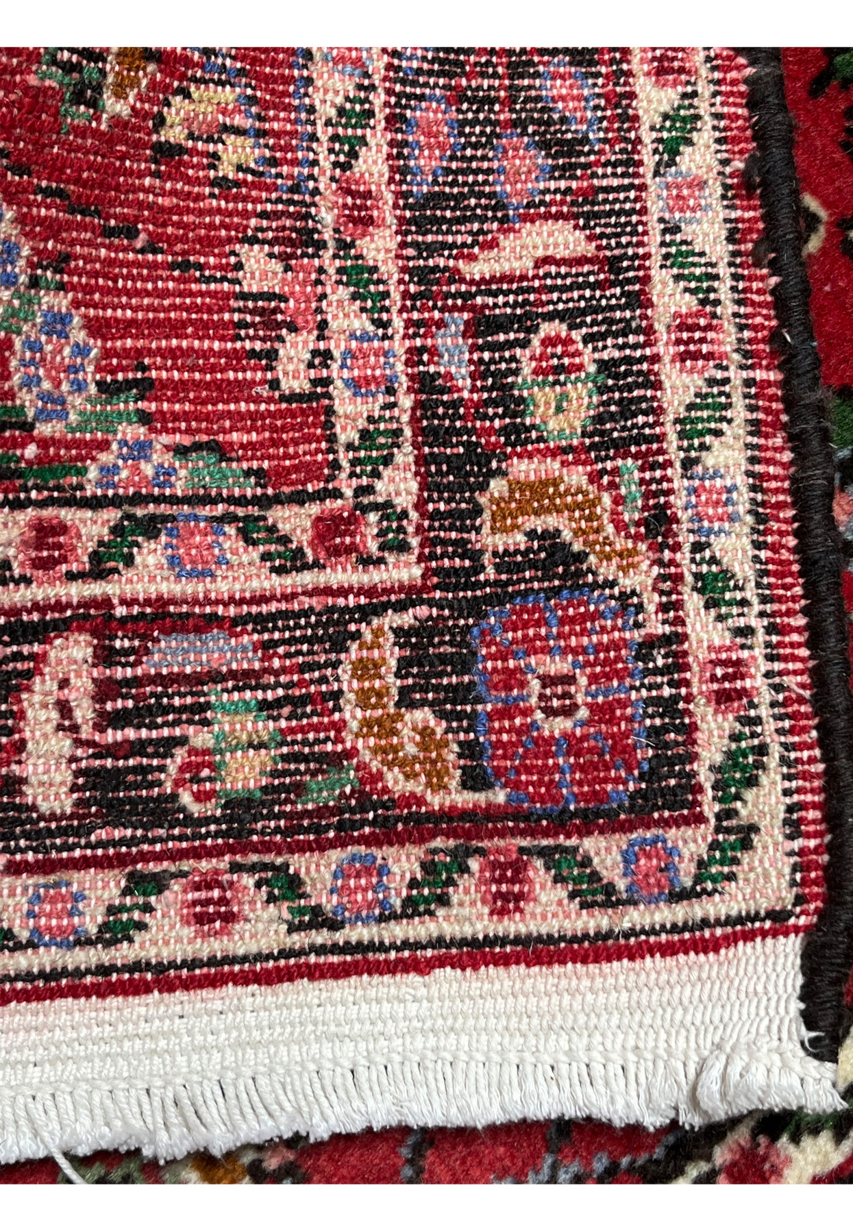 Backside view of a Persian Darjazin rug showing tight, even knotting, wool foundation, clear pattern visibility, and authentic village weaving technique