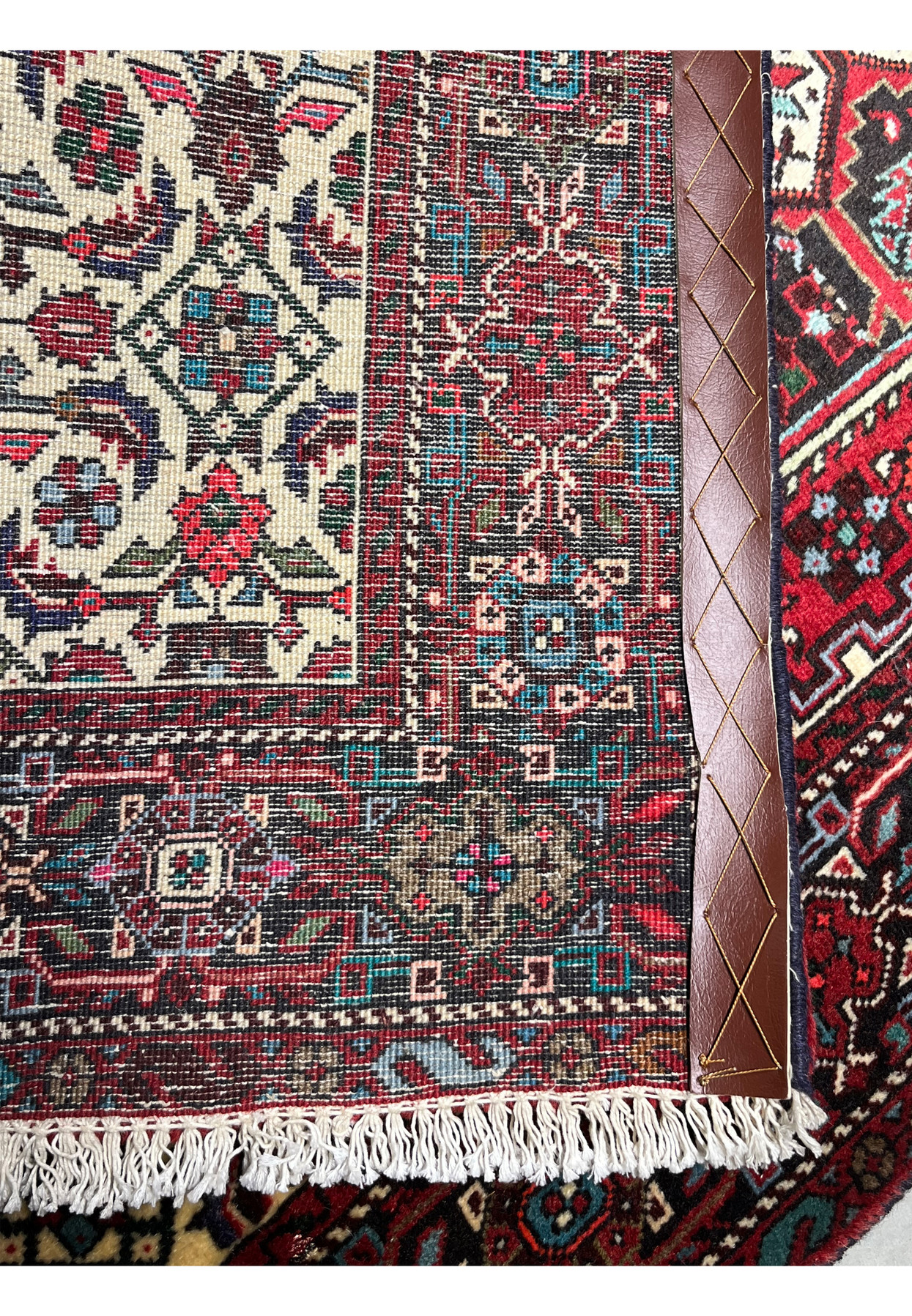 Backside view of a hand-knotted 3'4 x 5'5 Persian Gholtogh rug displaying tight knot structure, clear tribal geometry, natural wool foundation, and traditional Persian weaving craftsmanship