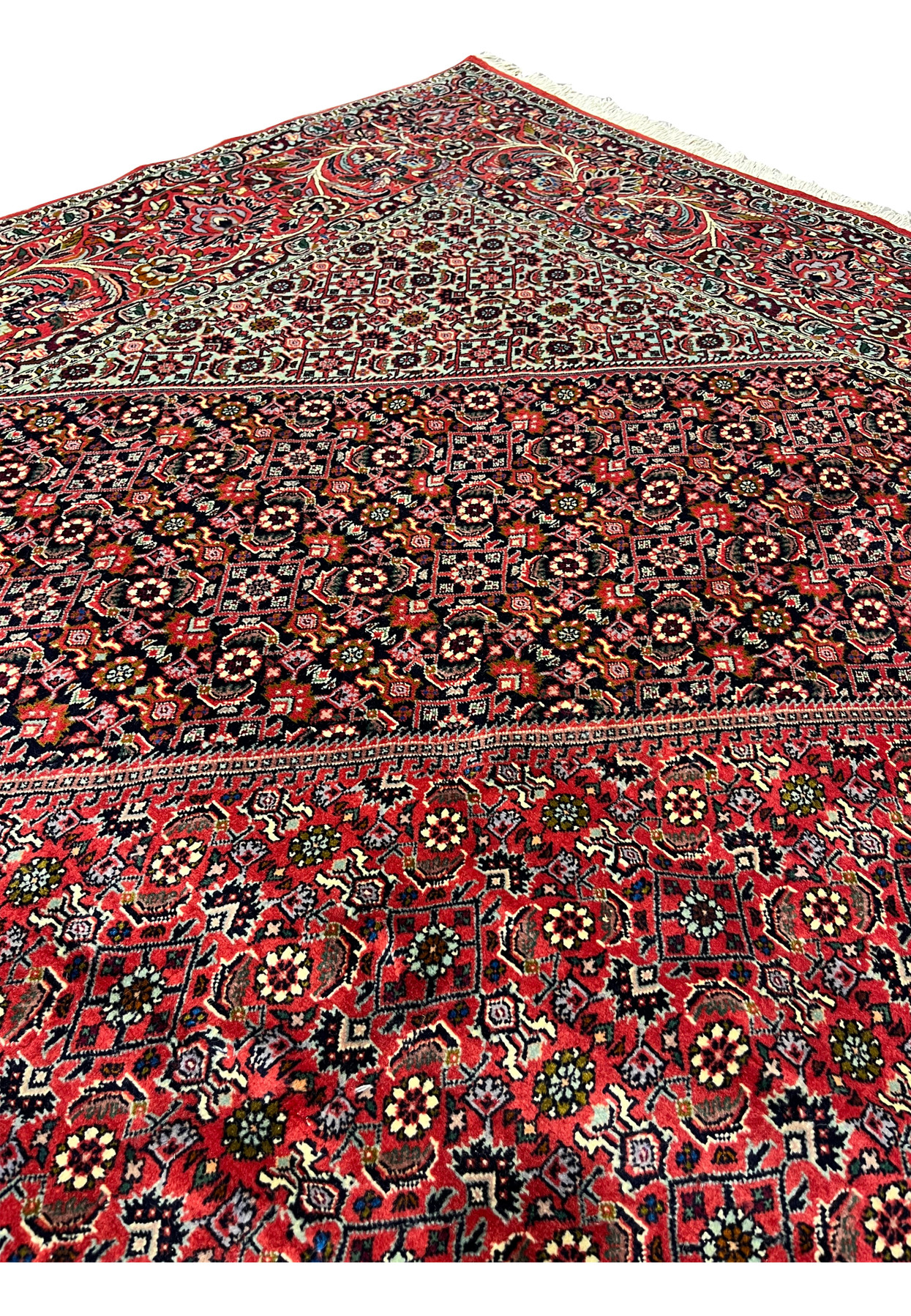 Foundation closeup of a Persian Bijar iron rug revealing extremely tight wool knots, firm structure, thick pile, and hallmark durability of Bijar weaving
