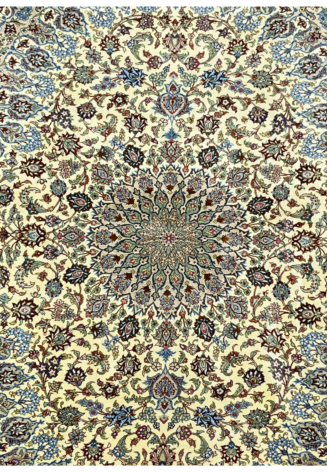 Close-up of the central medallion on a signed Persian Qum pure silk rug, highlighting layered floral geometry, balanced symmetry, and exceptionally fine silk weaving.