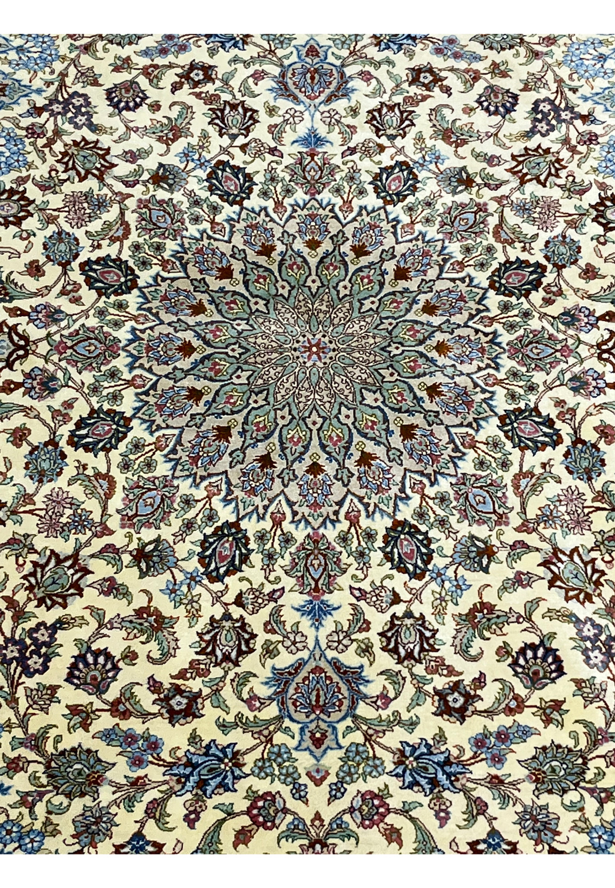Zoomed medallion detail of a signed Persian Qum pure silk rug emphasizing ultra-fine knot density, sharp floral articulation, and master-level silk craftsmanship.