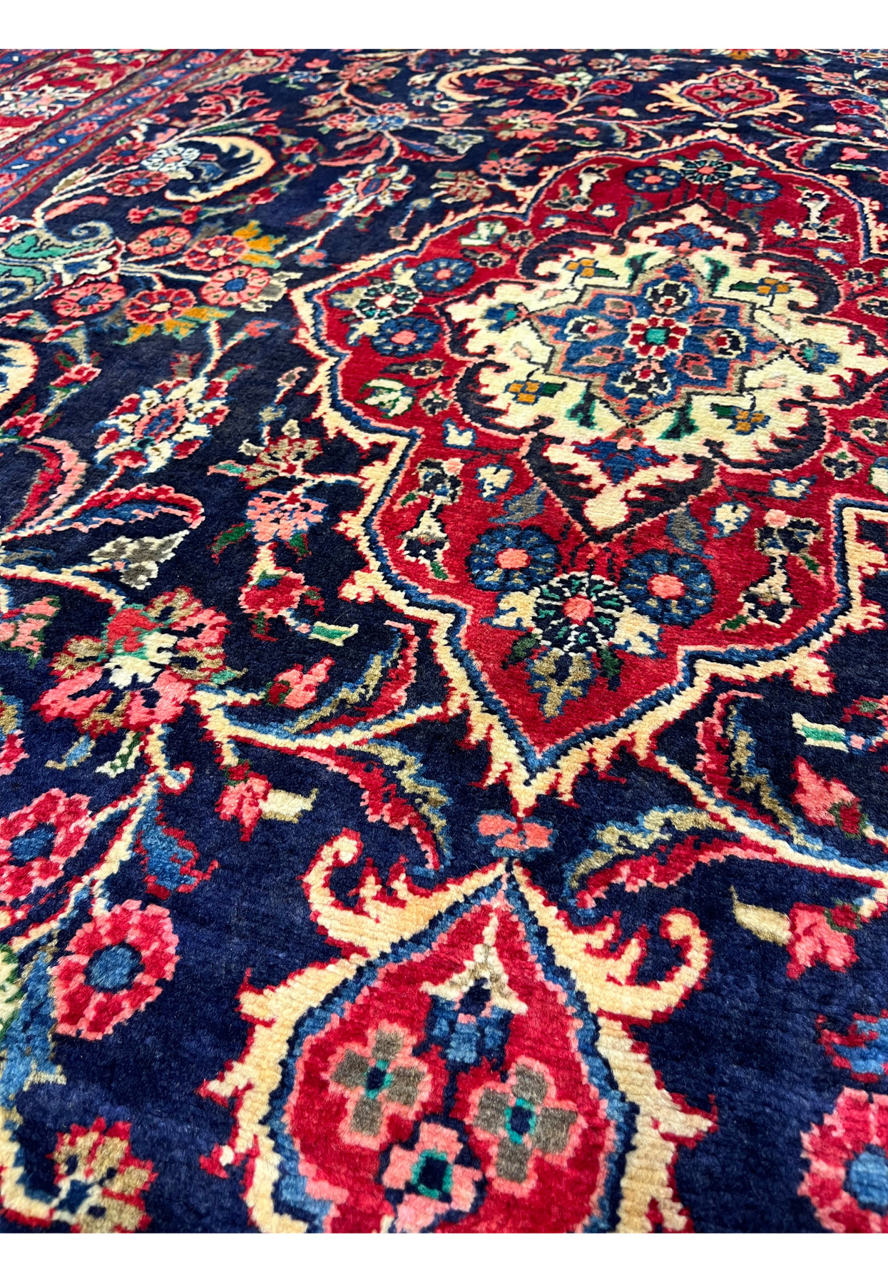 Back and face foundation detail exposing tight hand knots, woven structure, and authentic Persian construction with visible knot pattern