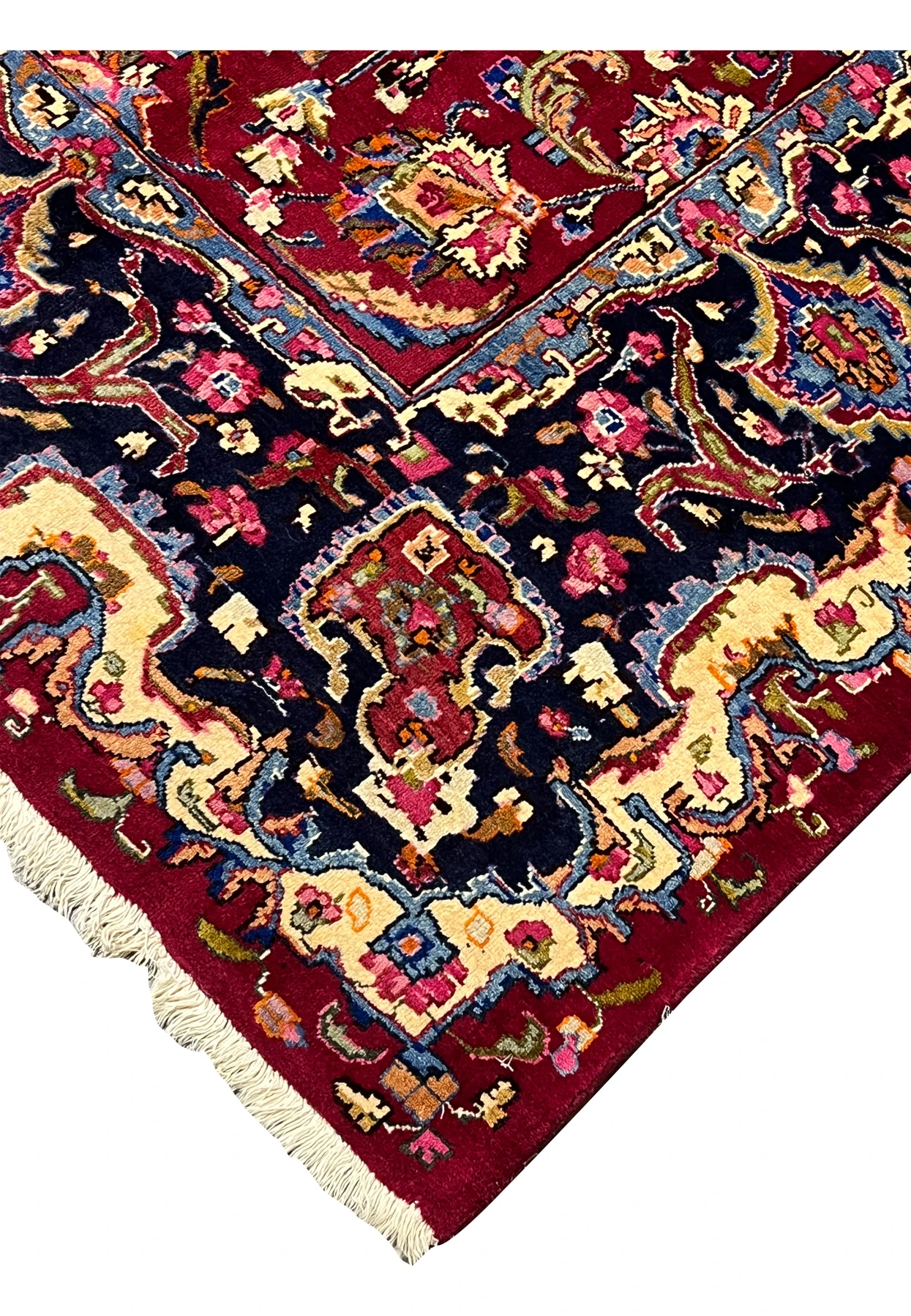 Edge and fringe view of handmade Mashad rug displaying clean finishing, intact foundation, and well-preserved wool pile