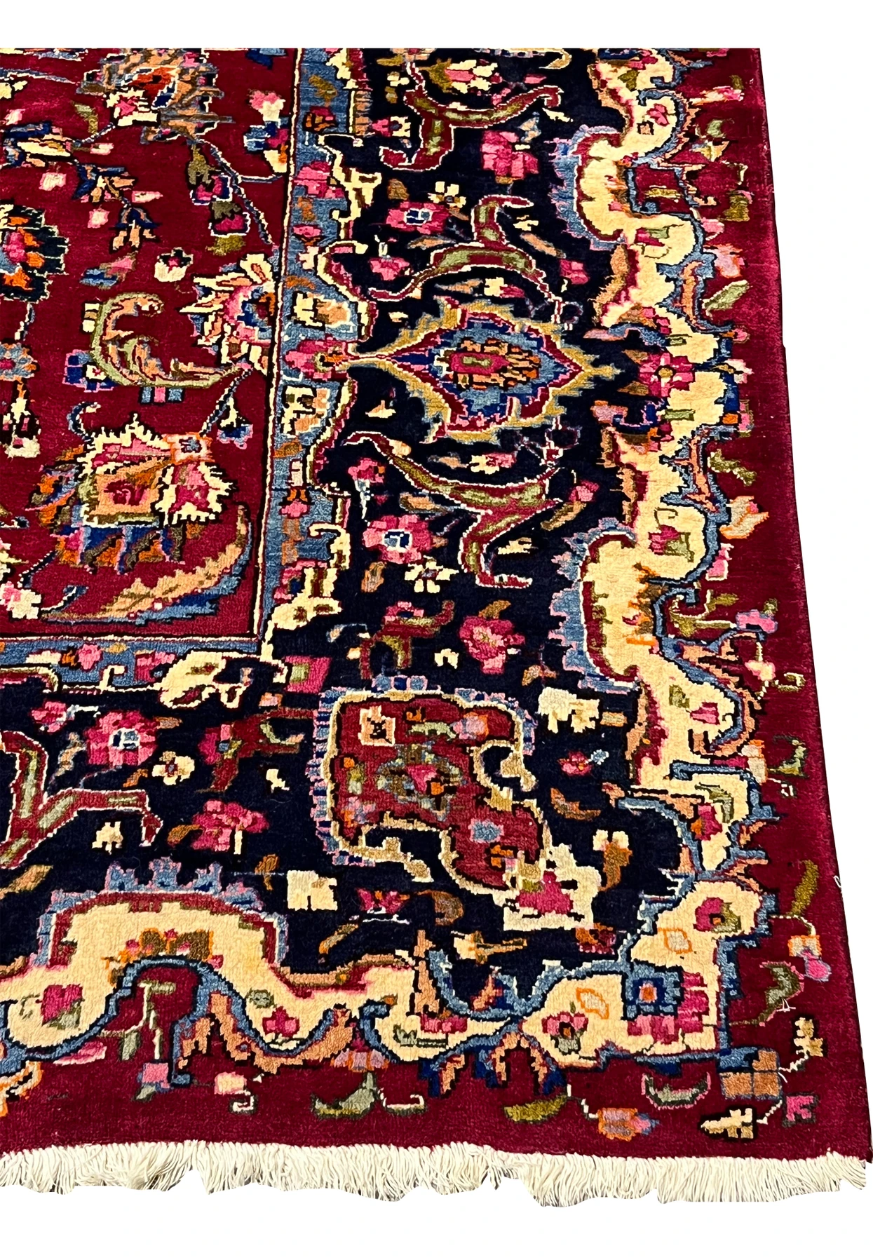 Border detail showing layered guard borders, floral scrollwork, and classic Mashad design structure in rich contrasting tones