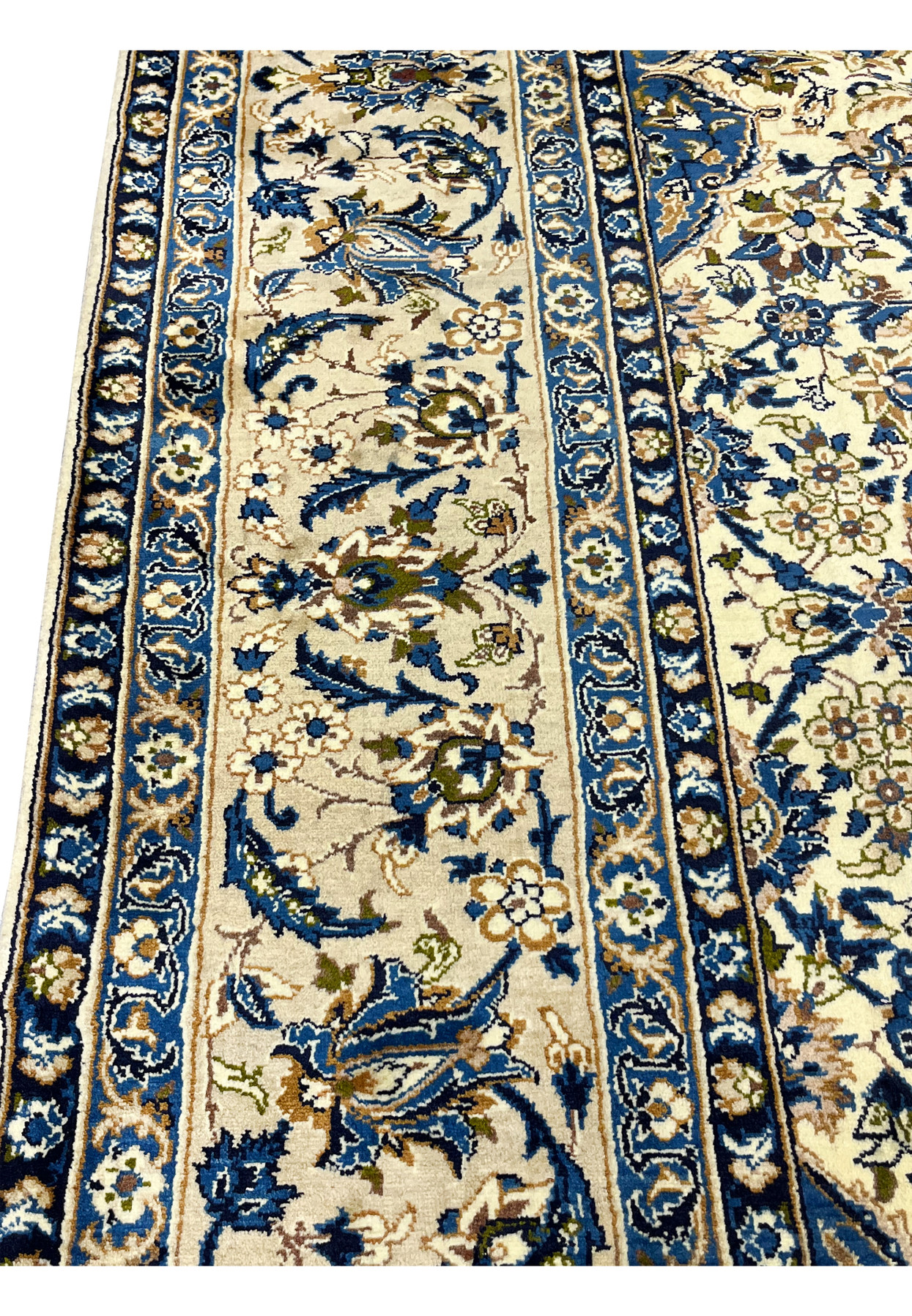 Border closeup of Persian Kashan rug highlighting navy floral frame ivory accents gold details and fine craftsmanship