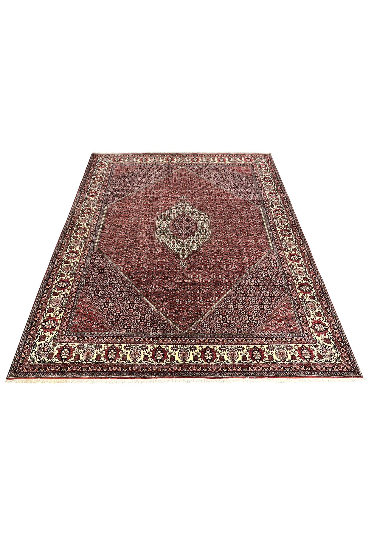 8'2 x 11'4 Persian Bijar Iron Rug laid down angle showing diamond medallion, deep red field, ivory border and tight allover floral motifs