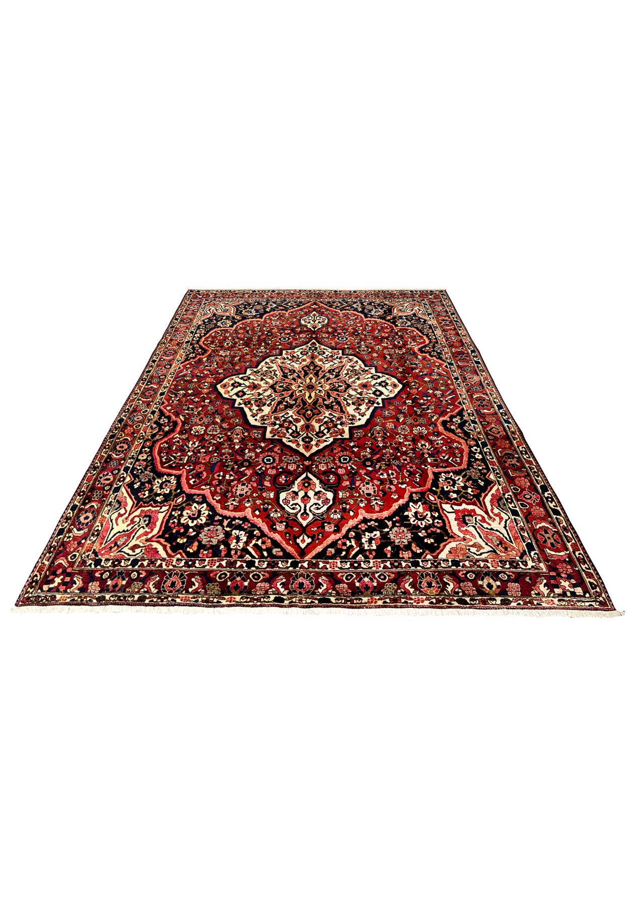 Persian Bakhtiari rug 10'9 x 13'7 laid flat, showing full medallion design in red and navy wool.