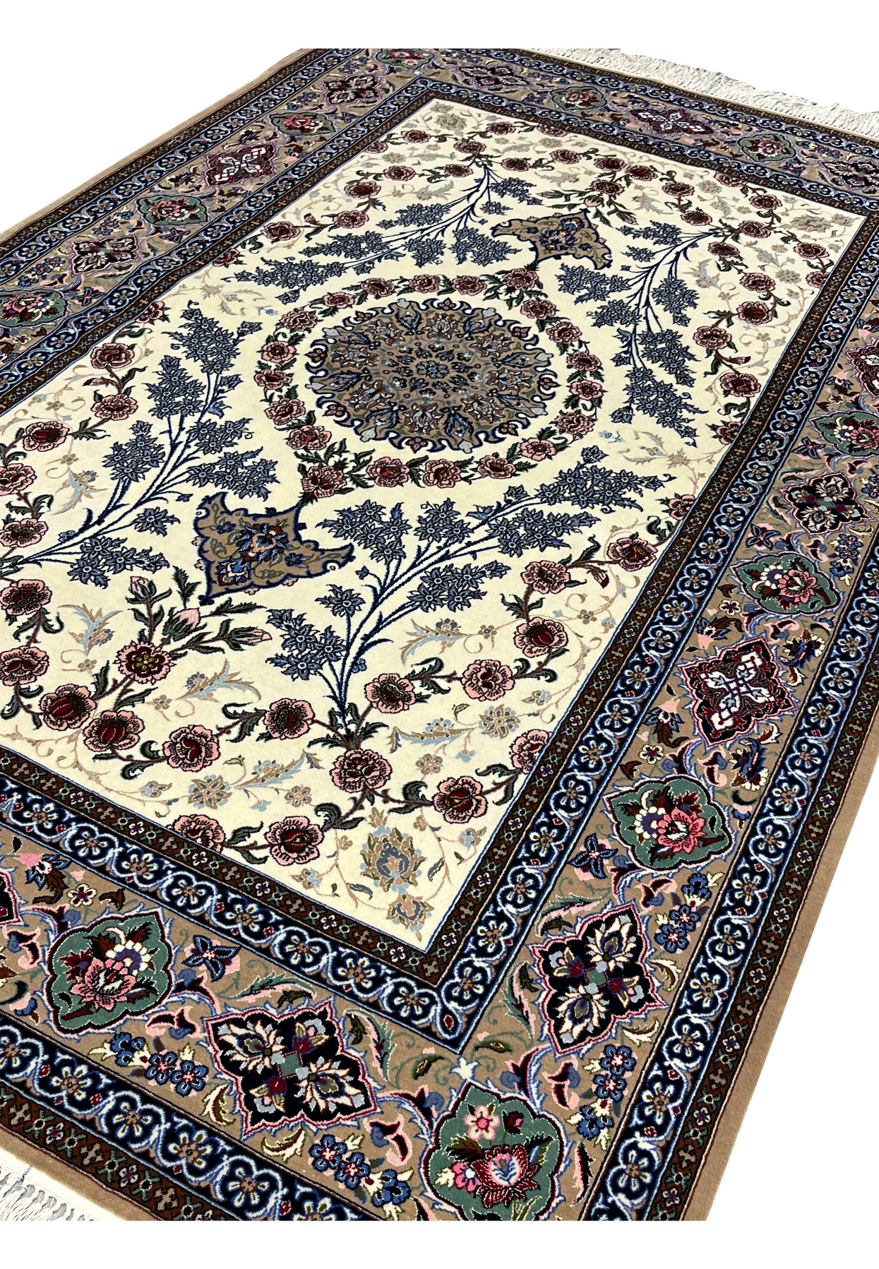 Angled view 5x8 Persian Isfahan wool silk rug ivory field blue medallion taupe border hand knotted Persia