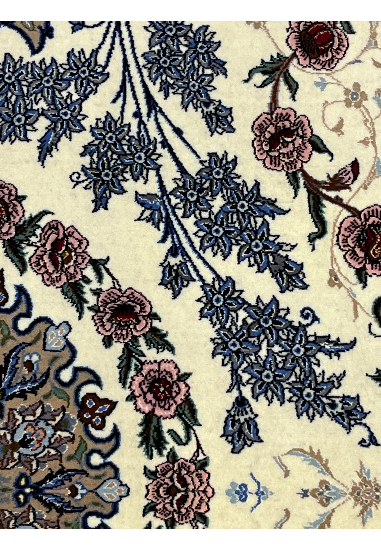 Pattern detail Persian Isfahan wool silk rug blue floral sprays pink peonies crimson centers ivory silk pile