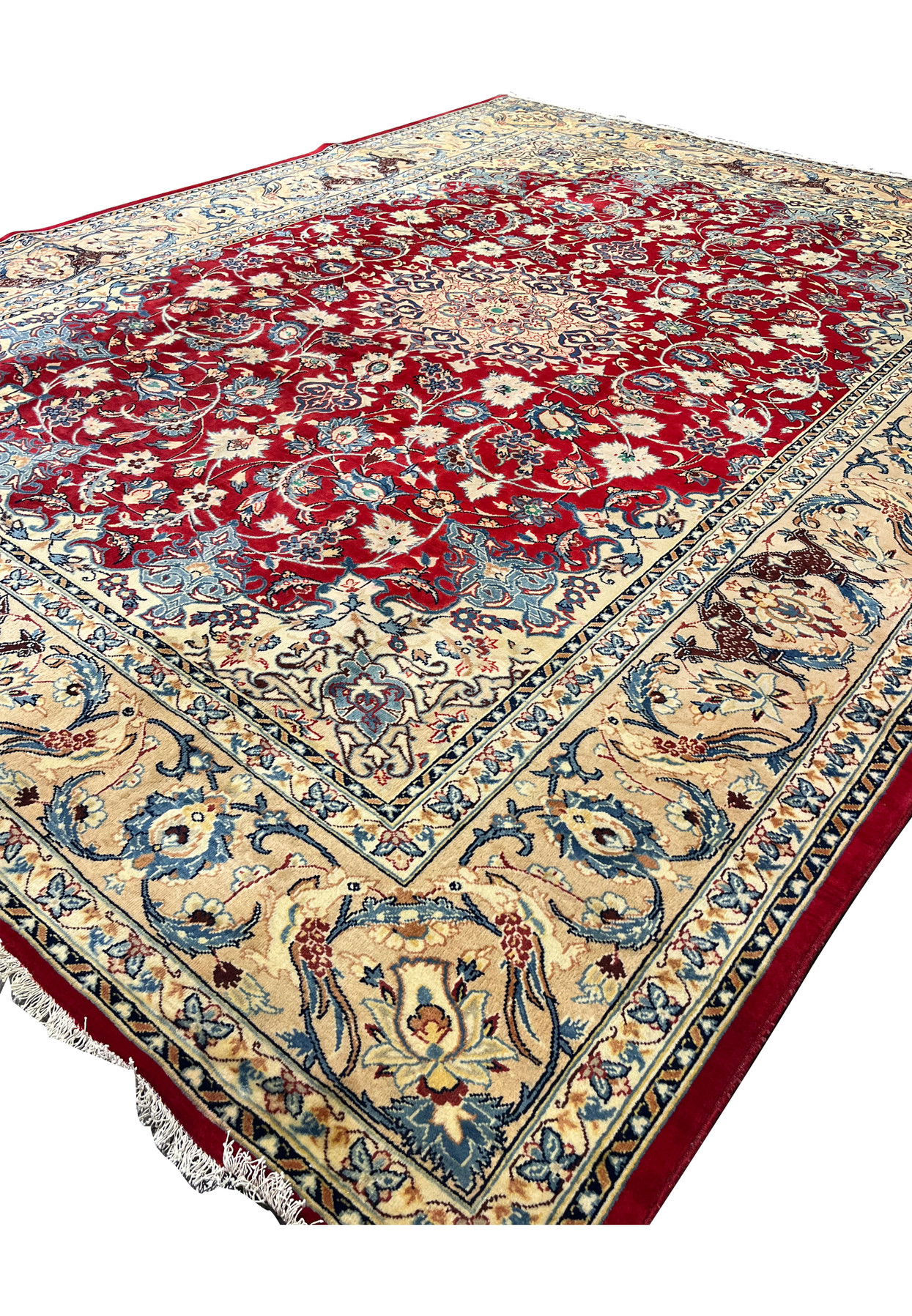 Angled view 10x13 handmade Persian Isfahan wool rug crimson red field ivory animal bird border blue floral scrollwork